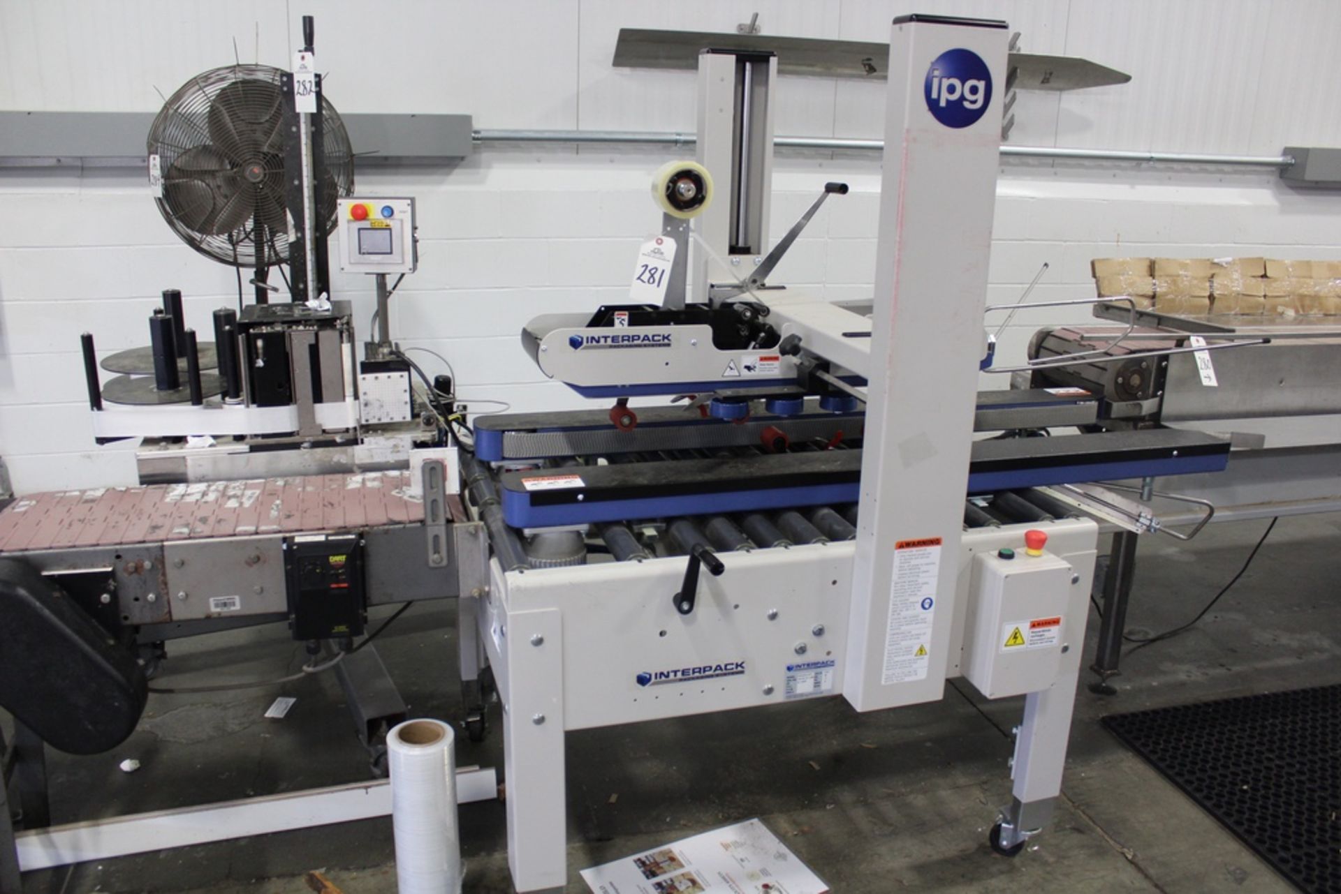 IPG Interpack Case Sealer, M# USA2024-BFF, S/N TM136 18 C 005 | Rig Fee: $125