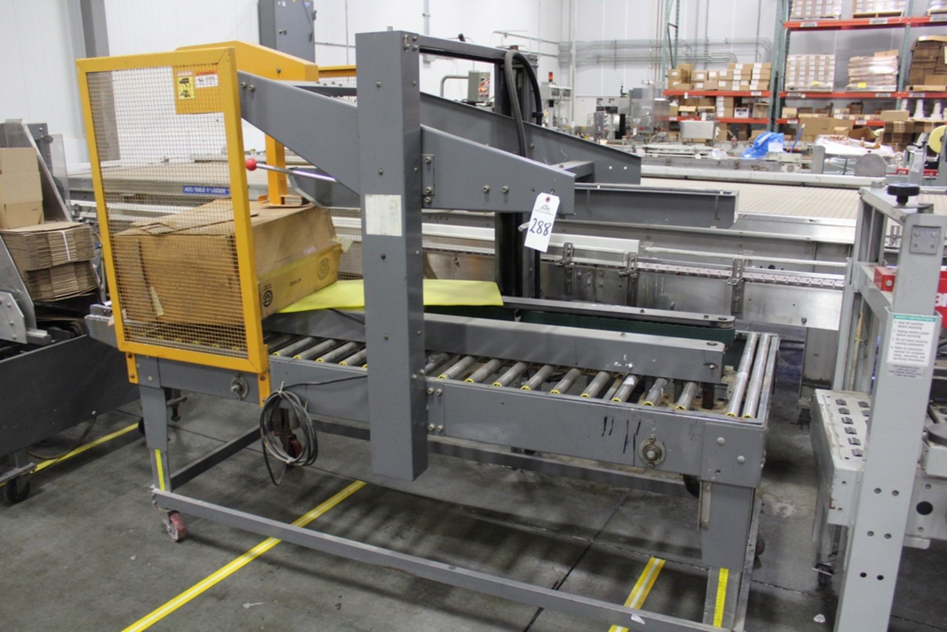 Packaging Systems Case Sealer, M# SD-557, S/N 0512002 | Rig Fee: $125