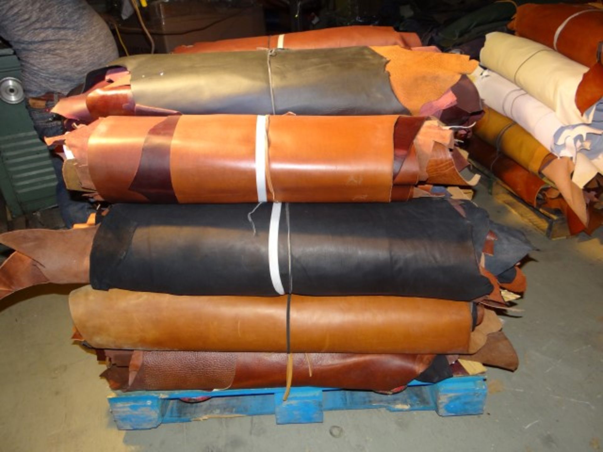 (600) Pounds of Leather. Assorted Colors and Thicknesses. Each Piece is at least 10 Sq.Ft.