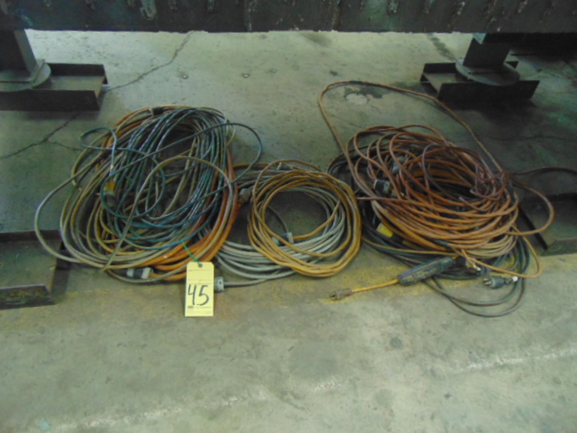 LOT OF EXTENSION CORDS, assorted (under one tables)