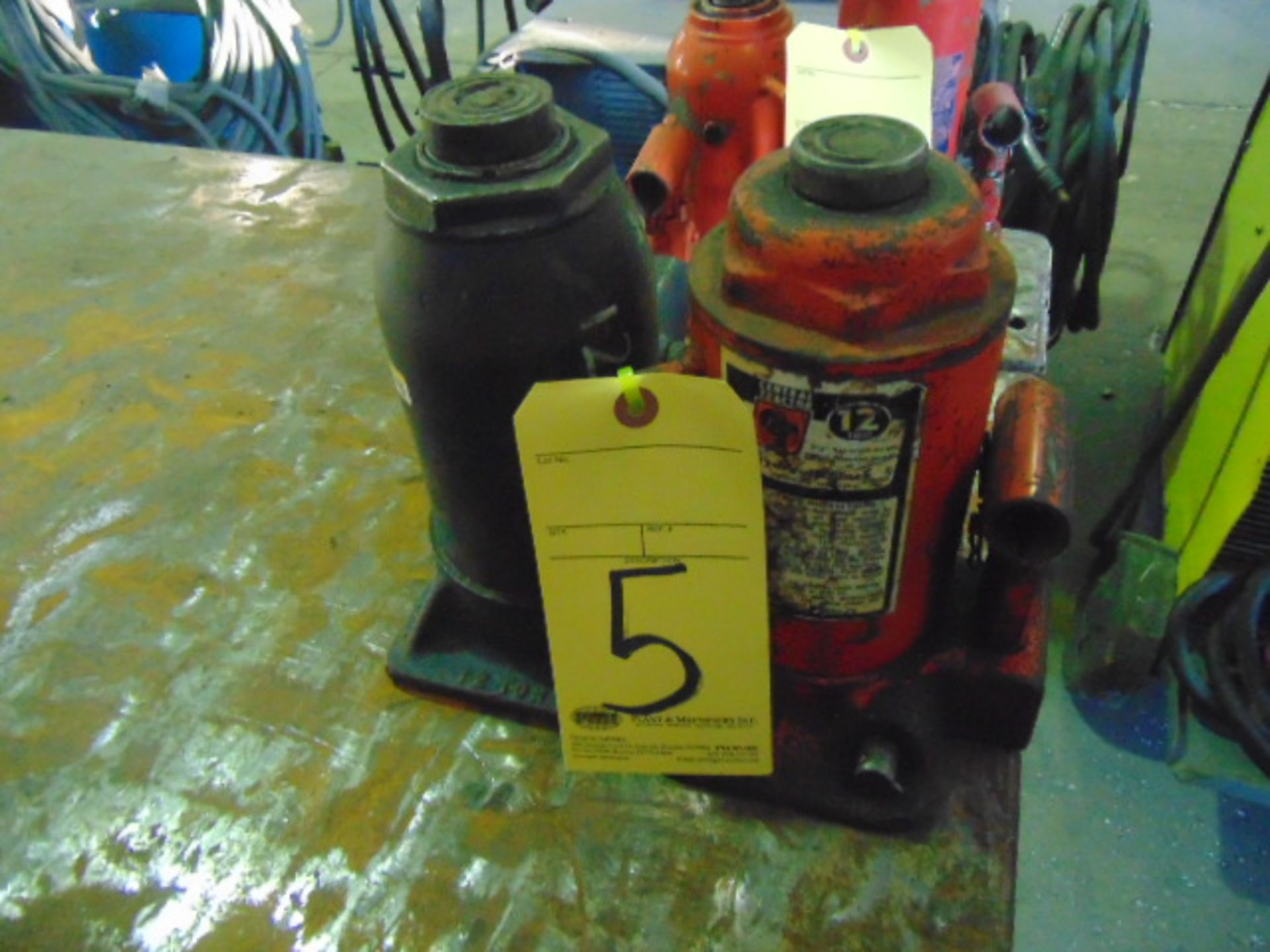 LOT OF BOTTLE JACKS (2)