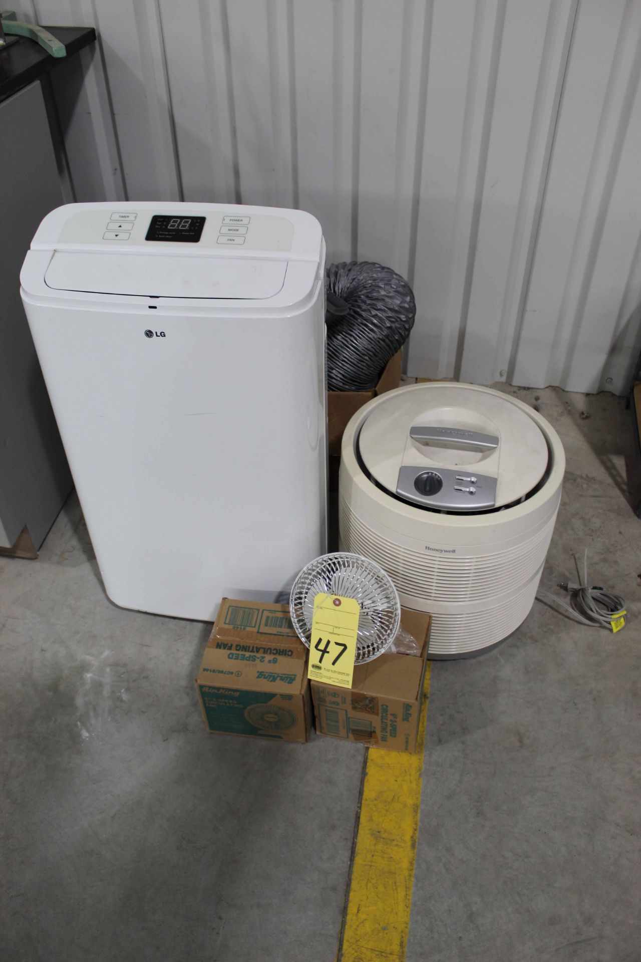 LOT CONSISTING OF: L.G. Company portable air conditioners & heaters