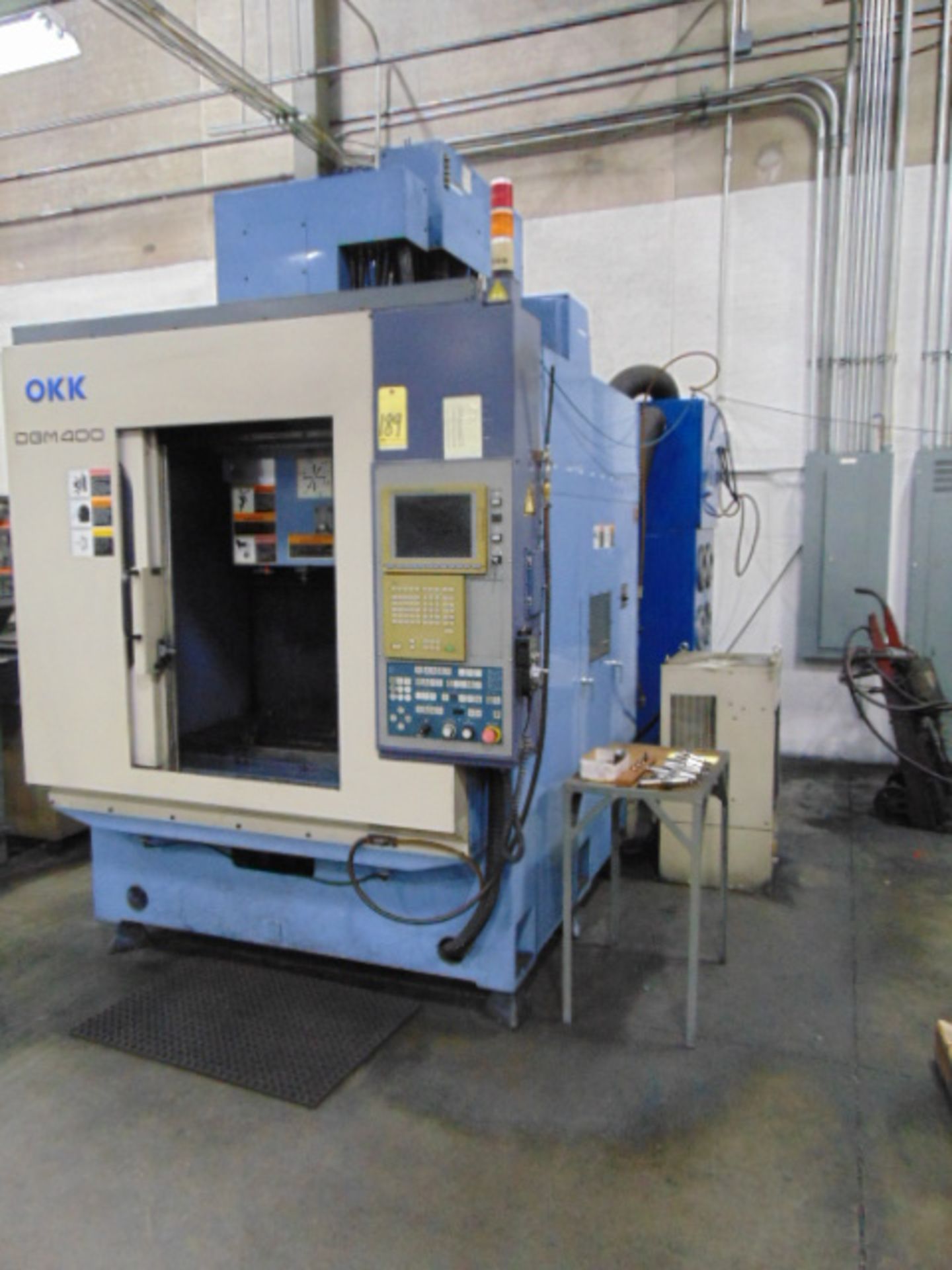 CNC GRAPHITE MILL, OKK MDL. DGM400, 18” x 30” table, 22” X, 16.14” Y, 16.14” Z axis travels, CAT-