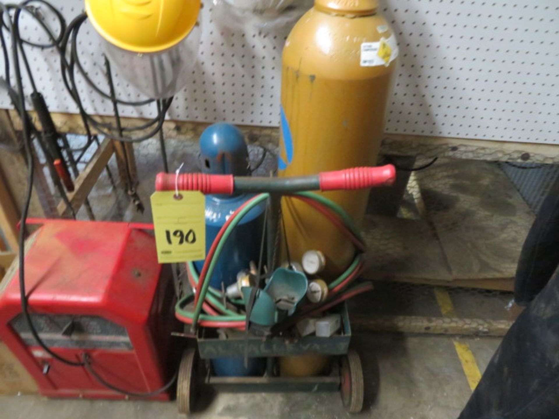 LOT CONSISTING OF: cutting torch (gas & air tanks included), w/cart & valves, arc welder, w/helmets,