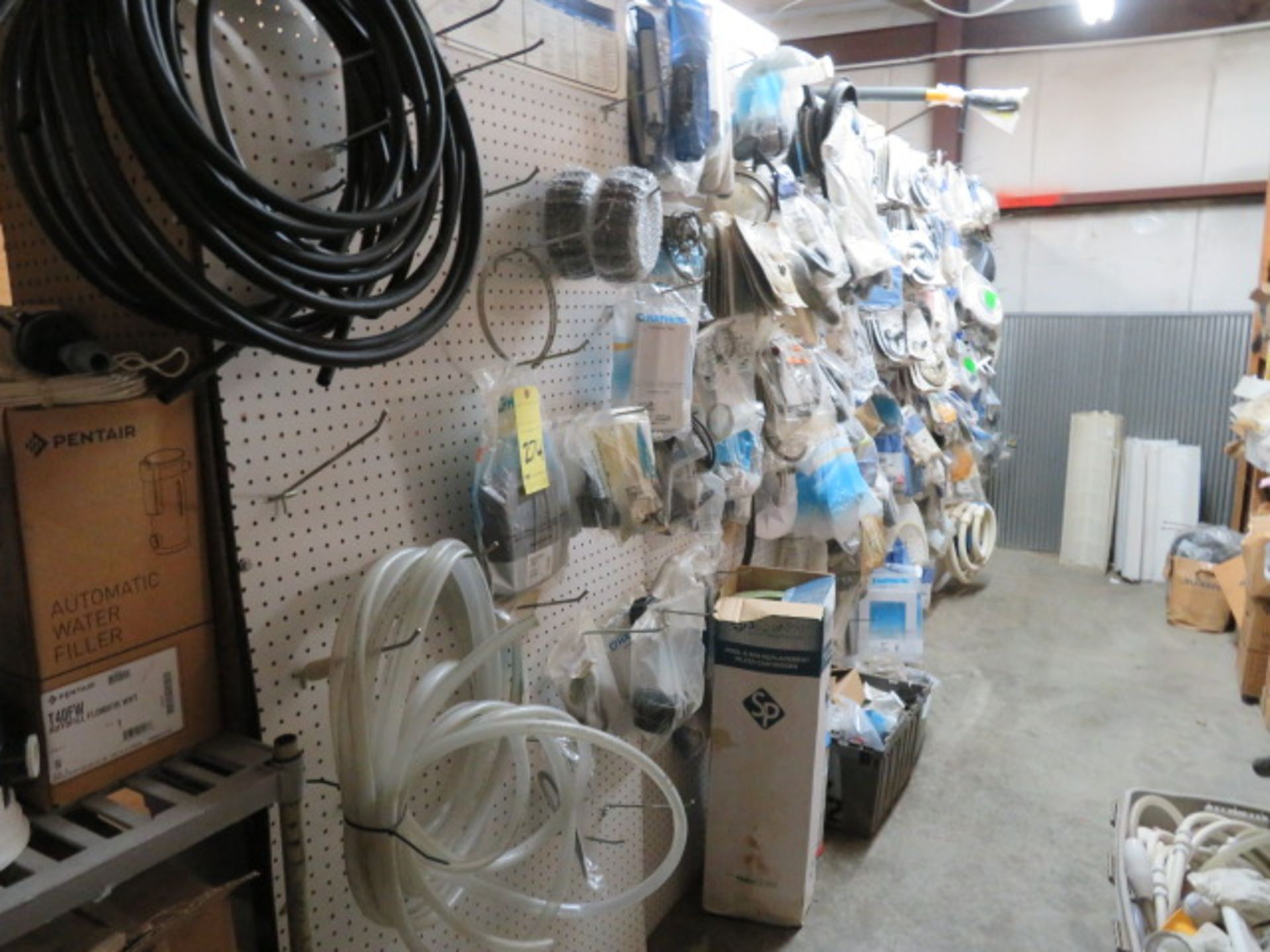 LOT CONSISTING OF: pool sweep, filter parts, pump parts, table chlorinator parts, assorted