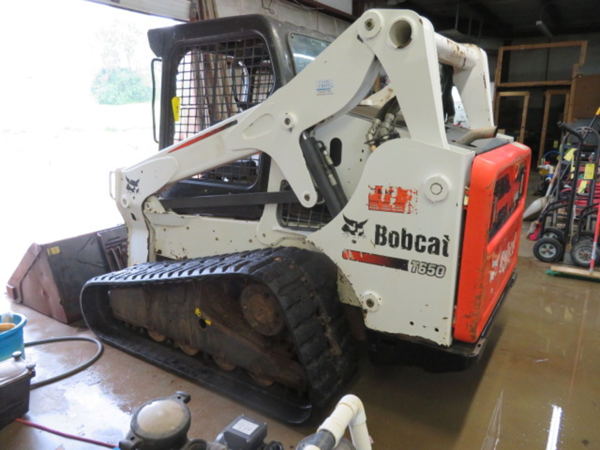 SKID STEER LOADER, BOBCAT MDL. T650, DIESEL TRACK TYPE, new 2012, 980.2 H.O.M., 2,750 lb. rated