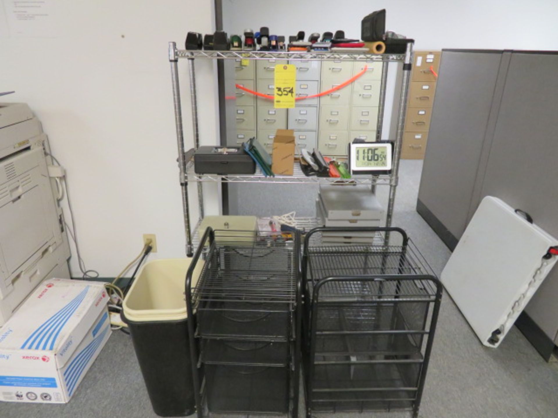 LOT CONSISTING OF: 4-shelf storage rack, (2) rolling wire file storage units, (3) trash cans,