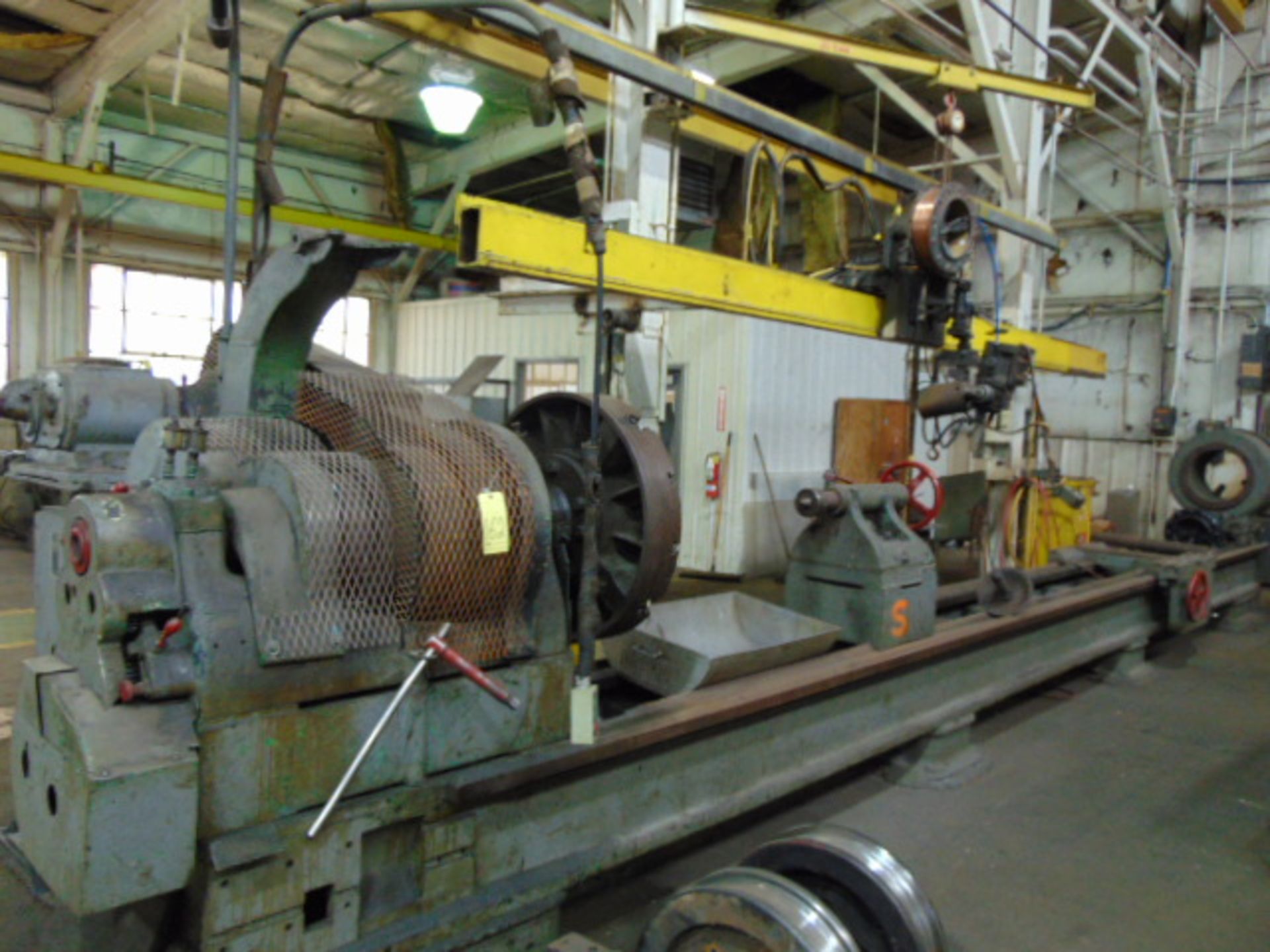 WELD OVERLAY LATHE, CUSTOM, 50” sw. over bed, 26’ dist. btn. centers, H.D. cast iron lathe bed