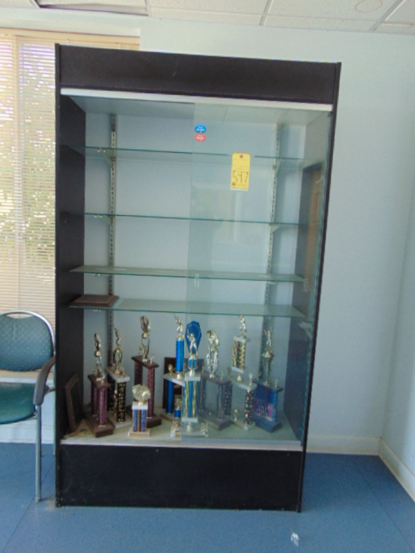 LOT CONSISTING OF: glass display case, table & (12) chairs