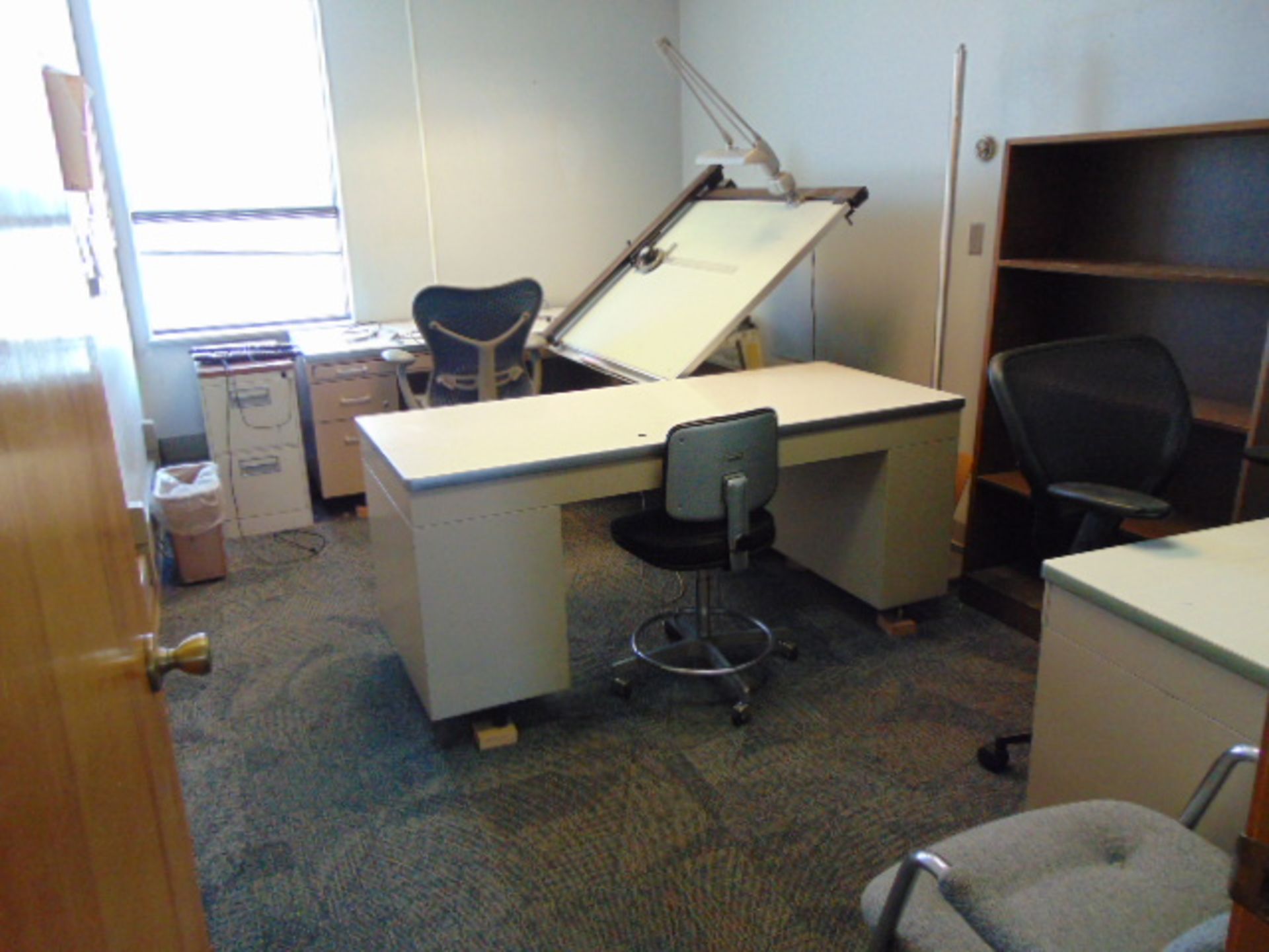 LOT CONSISTING OF: drafting table, (2) desks, file cabinet, bookcase & (3) chairs (located