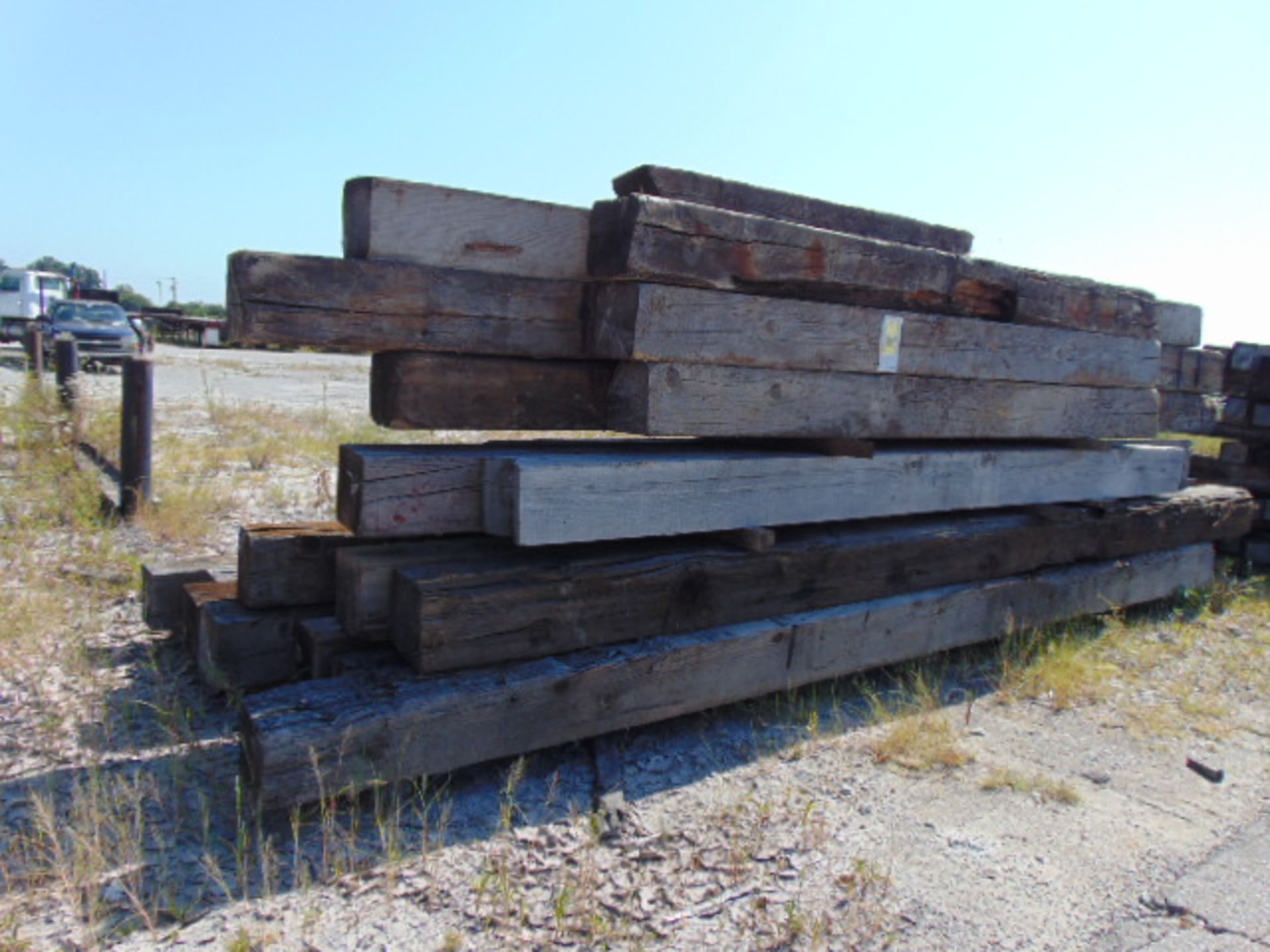 LOT OF TIMBERS, 12" X 12", assorted (in one row)