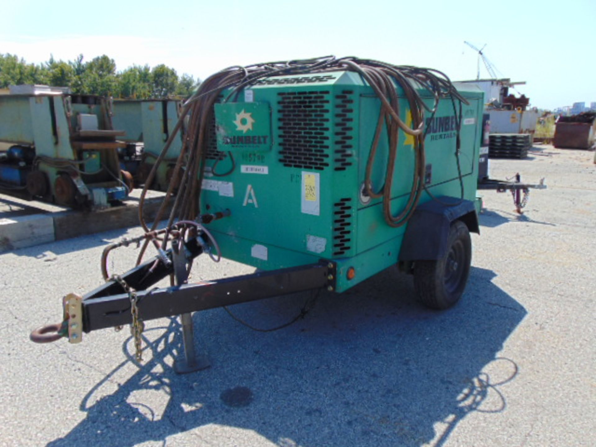 PORTABLE AIR COMPRESSOR, INGERSOLL-RAND MDL. XP375W0U7, new 2006, Doosan diesel engine, sgl. axle,