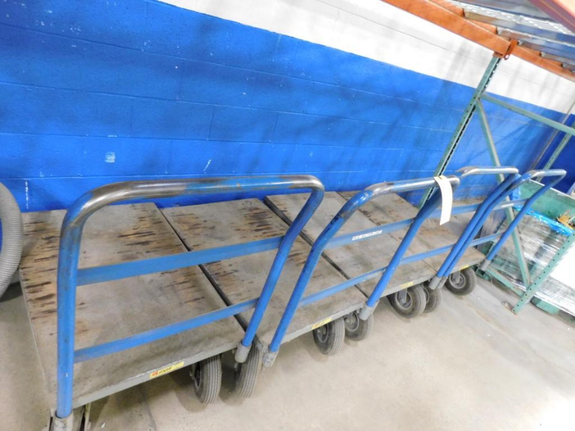 LOT OF ROLLING SHOP CARTS (4)