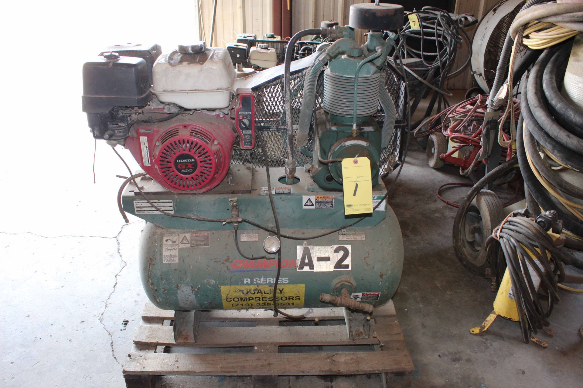 PORTABLE AIR COMPRESSOR, CHAMPION 2-STAGE, pwrd. by Honda GX390, elec. start, 20 gal. horiz. tank