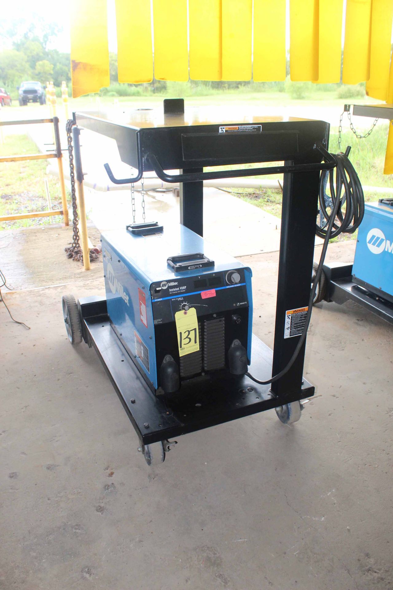 WELDING MACHINE, MILLER MDL. INVISION 456P, 400 amps @ 44 v., 100% duty cycle, on roller cart, S/N