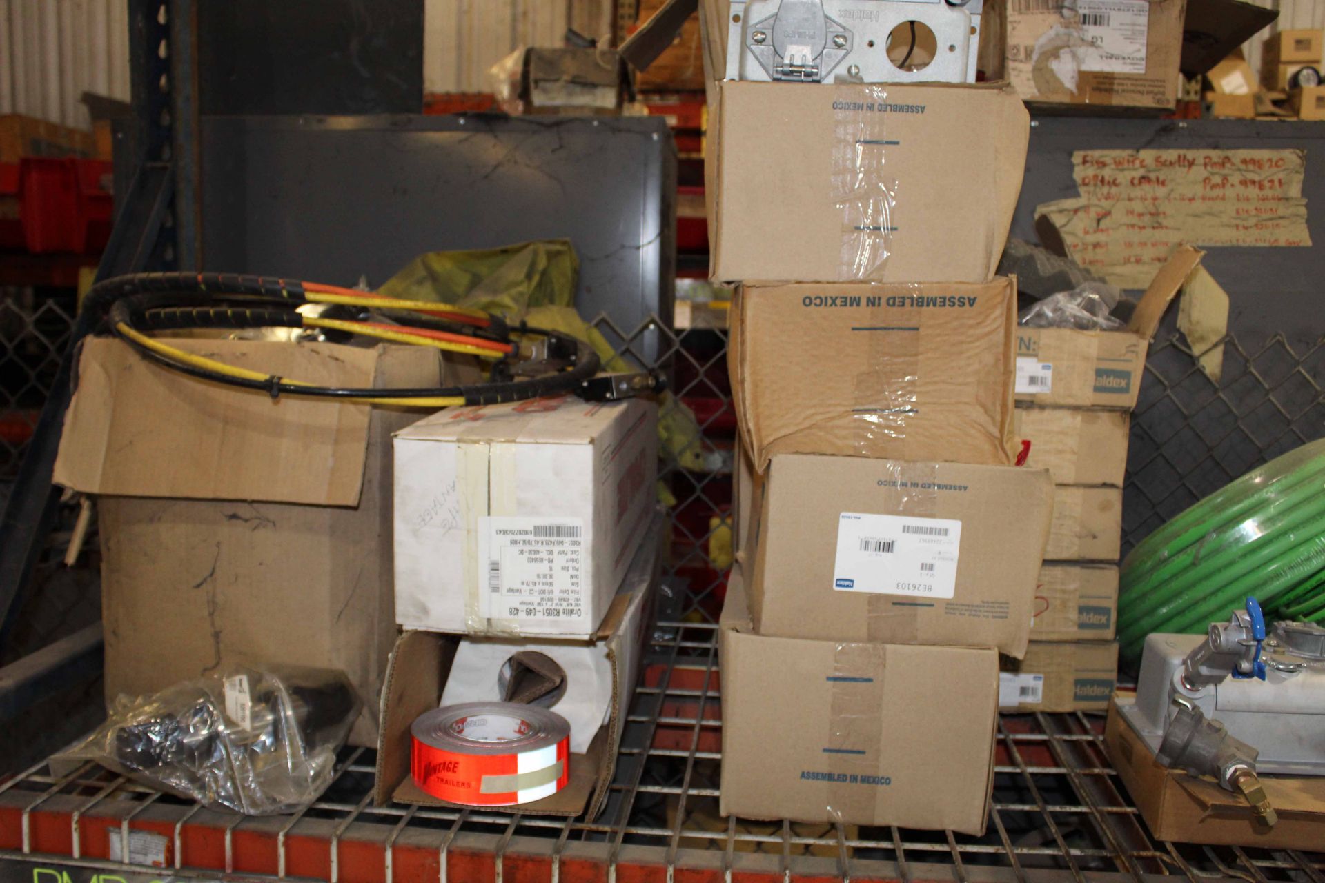 LOT CONSISTING OF: air brake tubing, Haldex Nosebox assemblies dust guards, etc. (on two racks) - Image 4 of 5