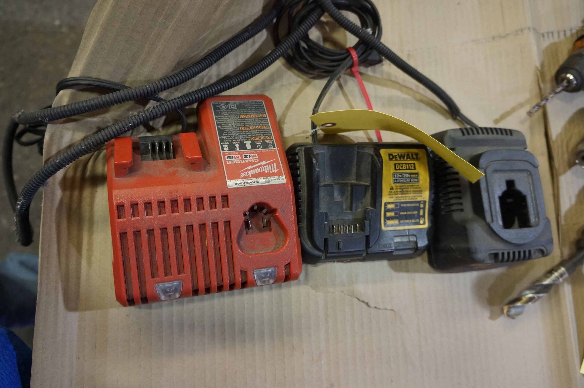 LOT OF HAND TOOL BATTERY CHARGERS