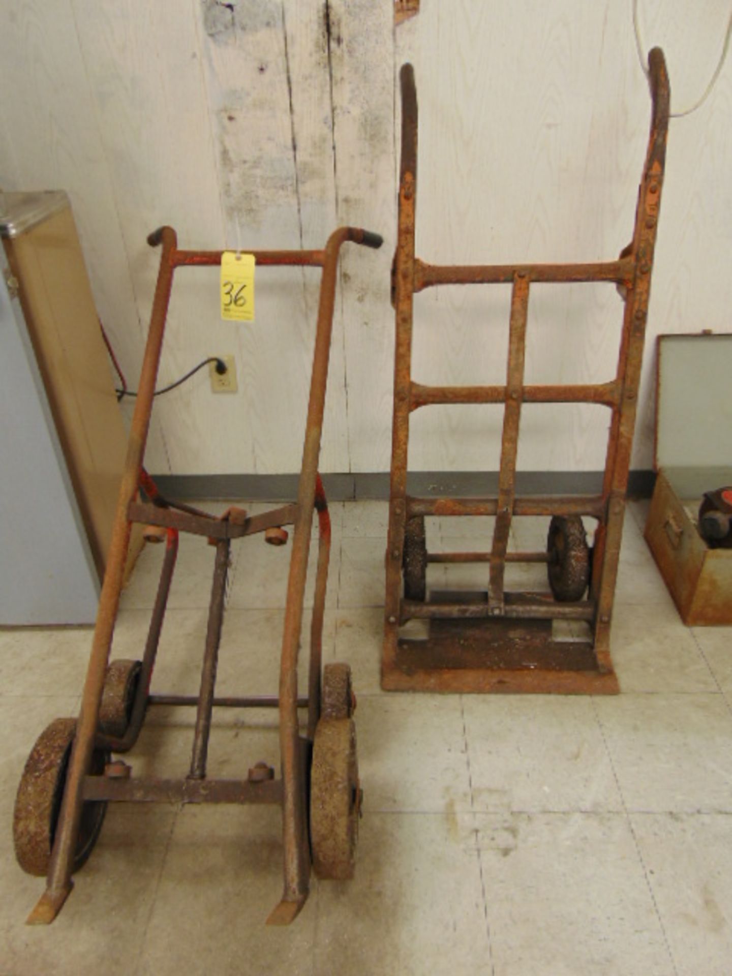 LOT CONSISTING OF: 2-wheel hand truck & barrel cart (Location: Bldg. 116)