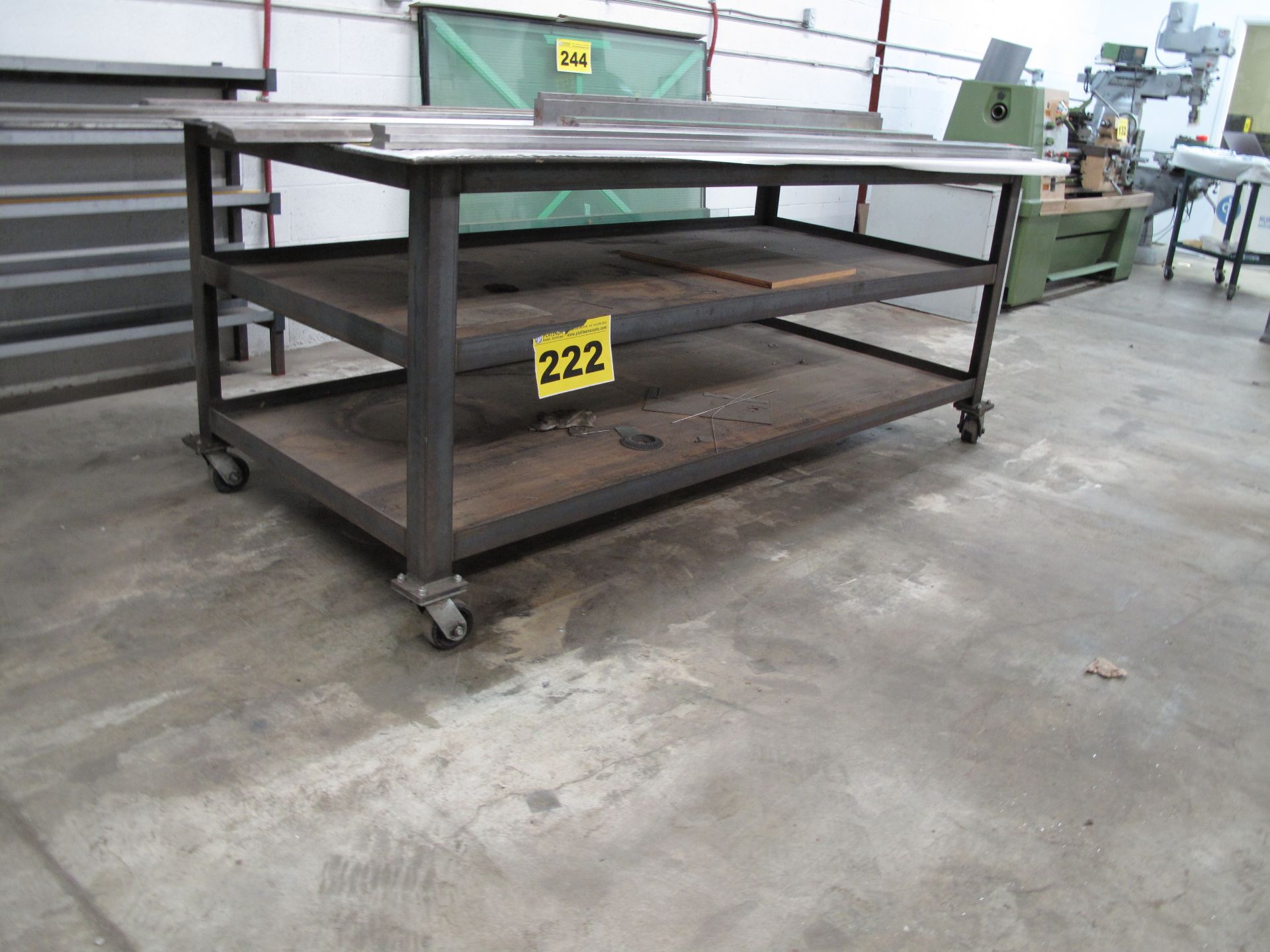 METAL, WELDED ROLLING WORK BENCH, 4' X 8', WITH LOWER SHELVES