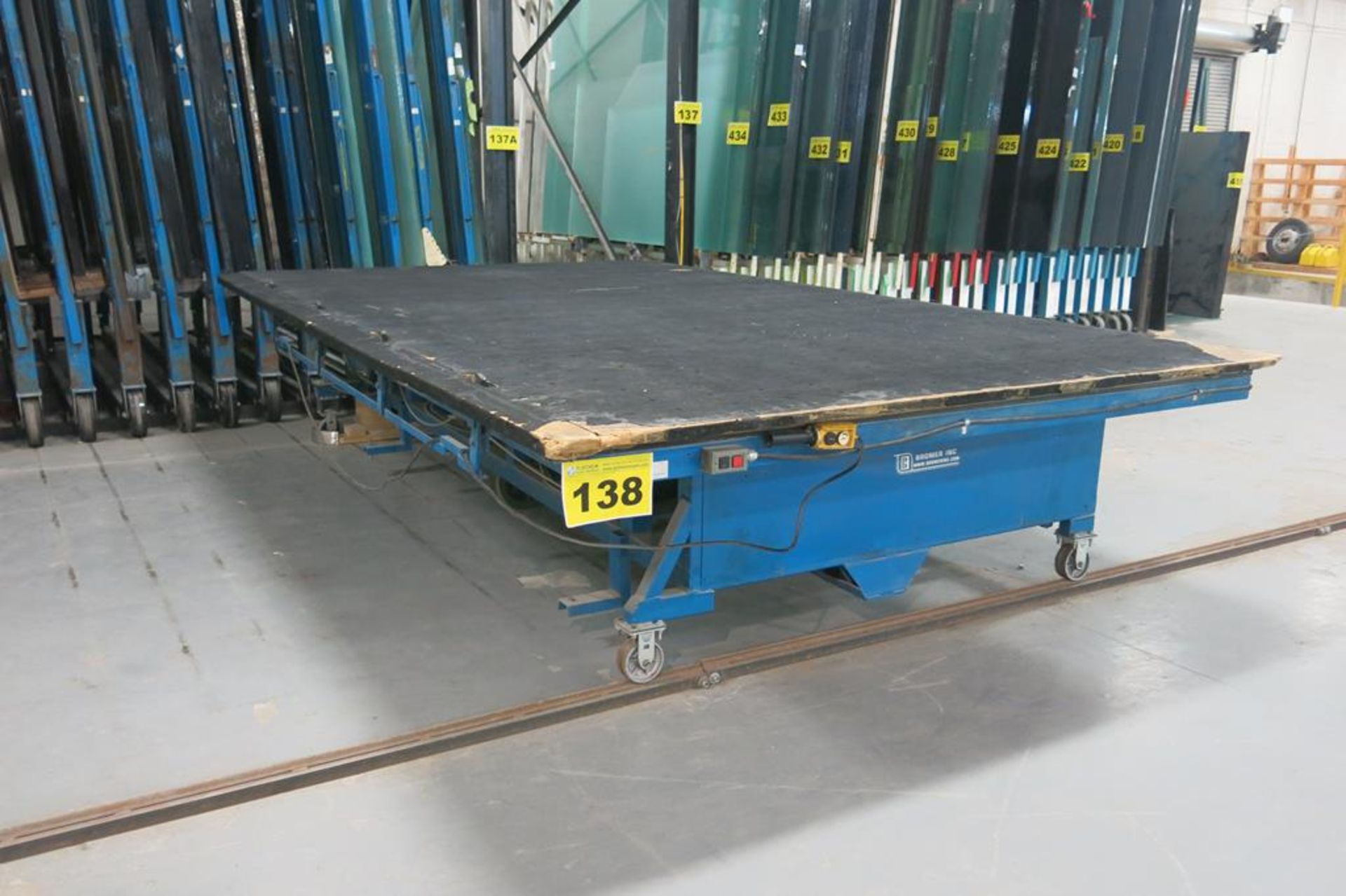 BROMER, MOTORIZED, TILTING TABLE, TABLE SIZE: 89" WIDE X 164" LONG WITH 50' OF RAIL