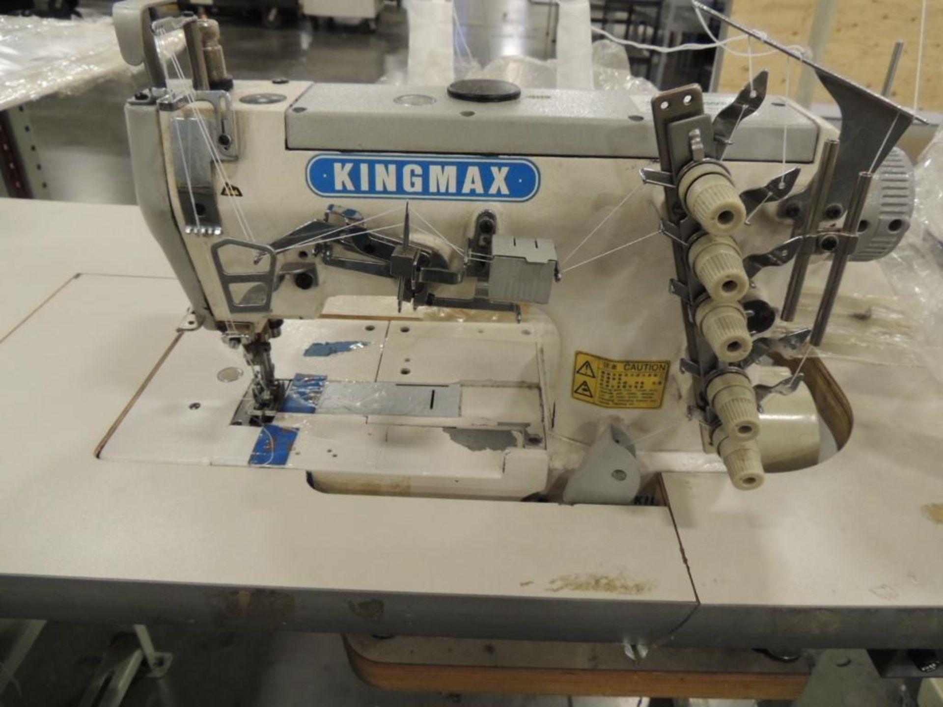 King Max CW-562 2-Needle, 3-Thread Sewing Machine, on Table