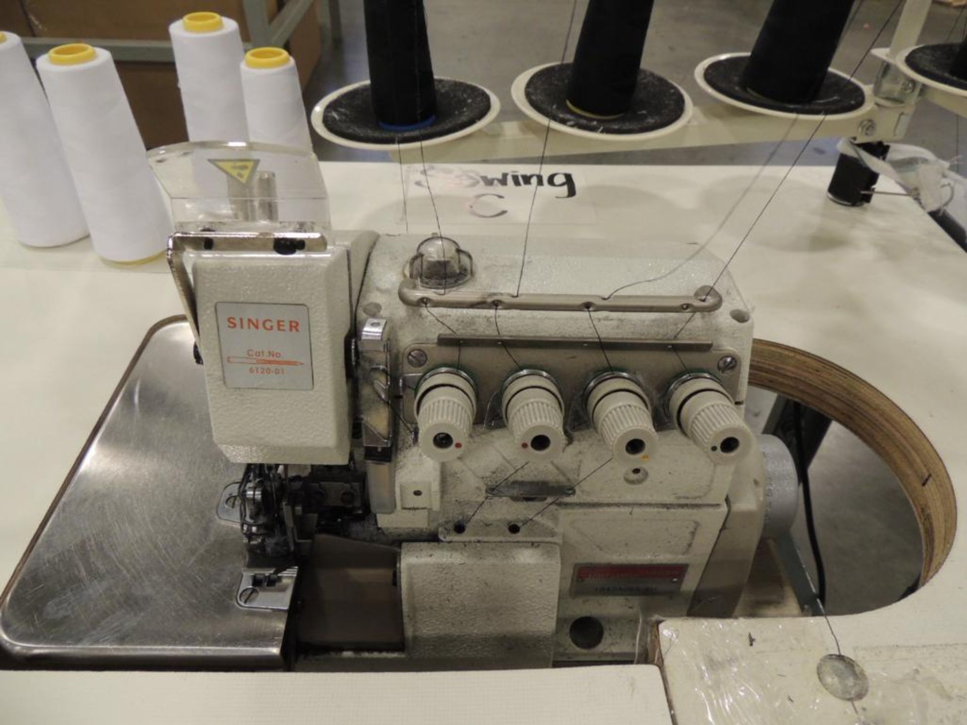 Singer 4842A065-6H Overlock 2-Needle, 5-Thread Sewing Machine, on Table