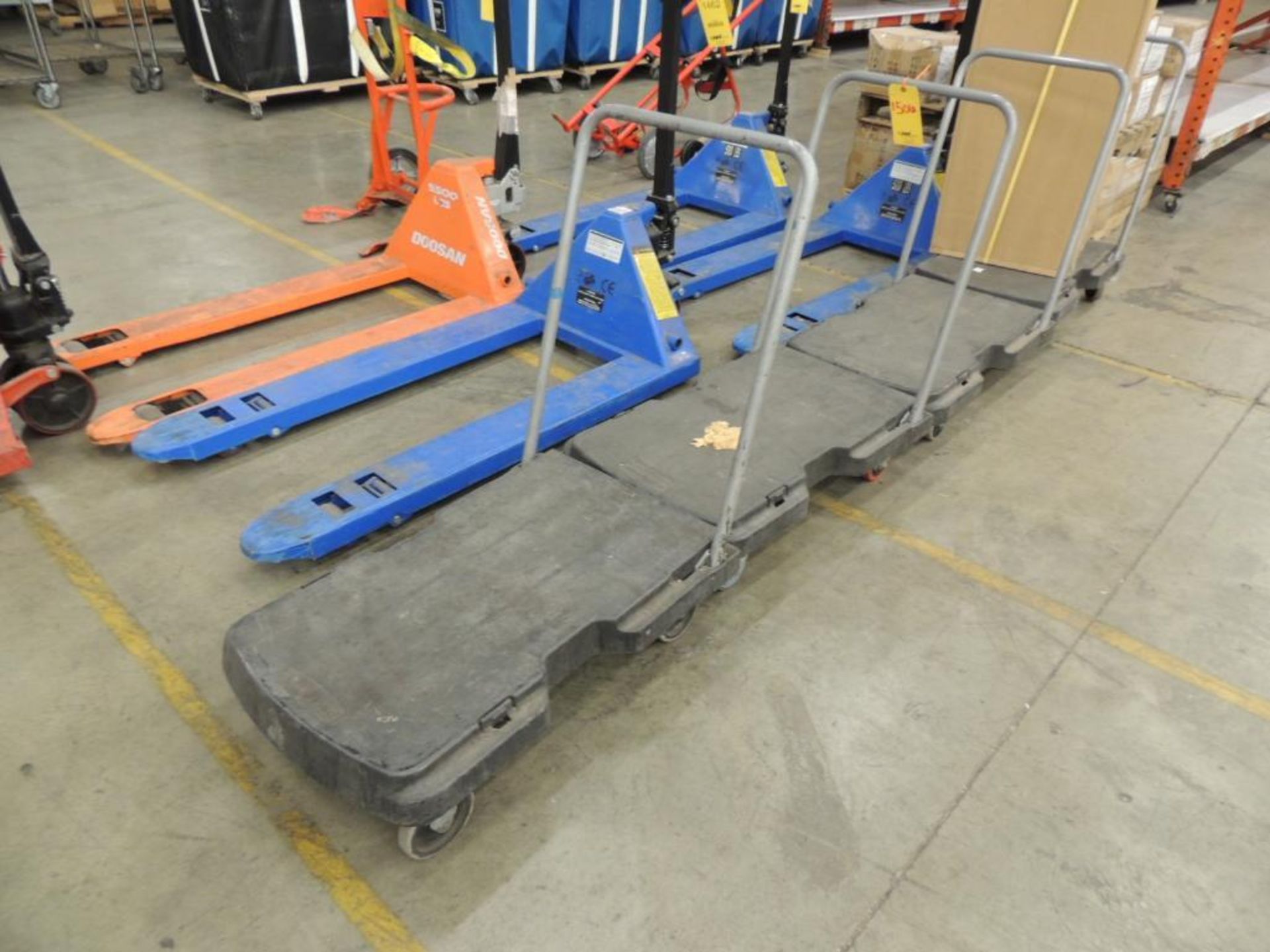 LOT: (4) Poly Deck Platform Trucks