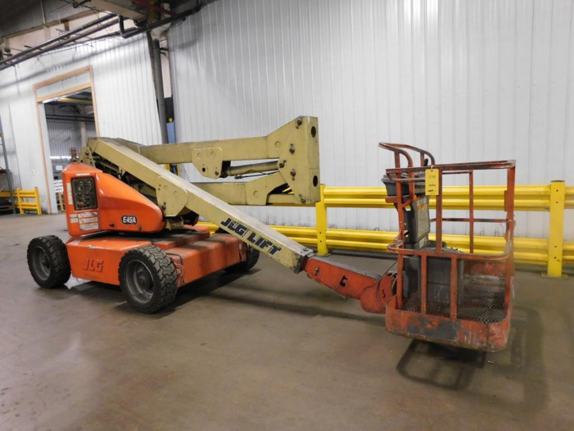 JLG 45 ft. Boom Lift Model E45A, S/N 030044824, 500 lb., Solid Tires