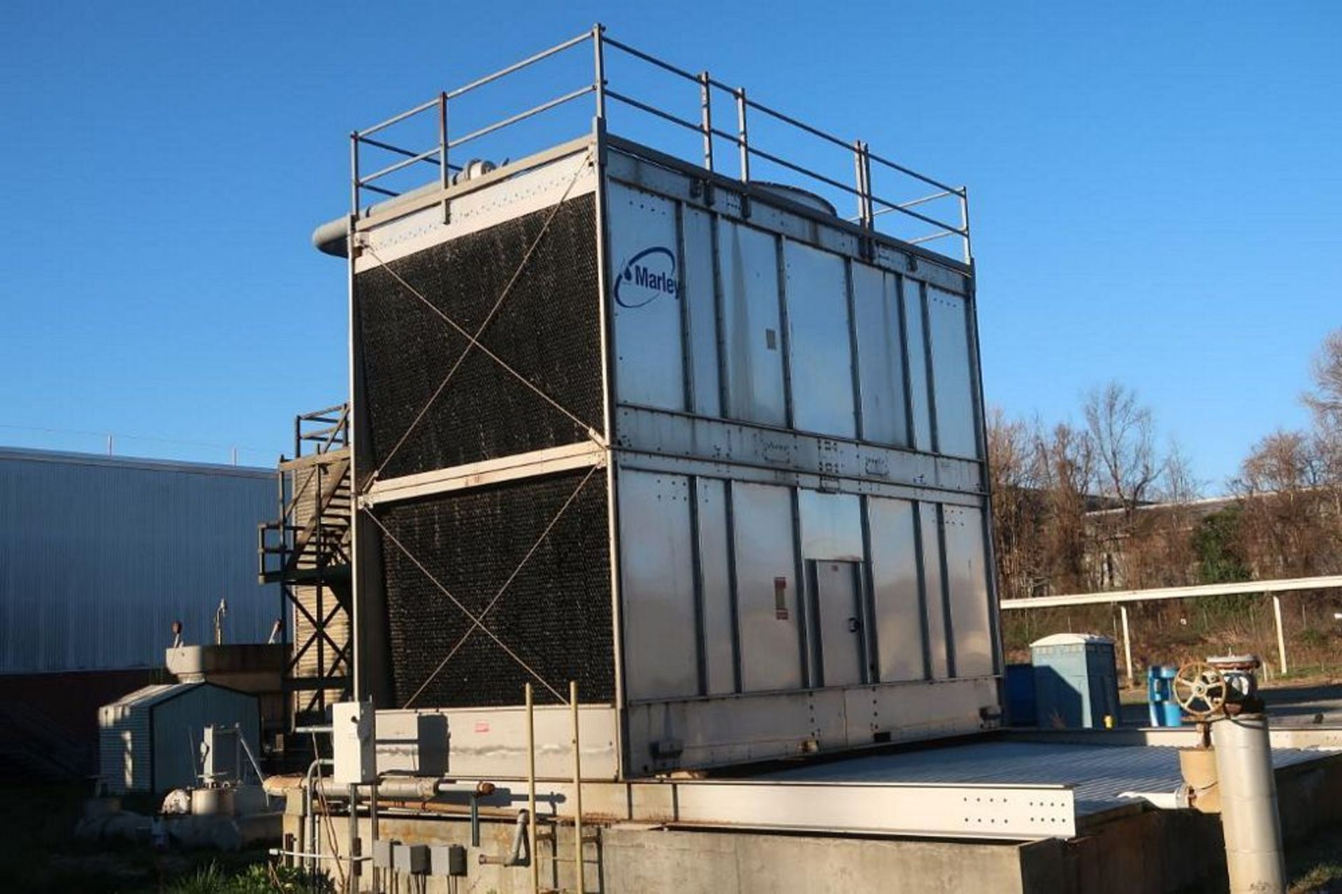 Marley 1000 Ton Double Flow Cooling Tower, 3800 Gallons per Minute, with (3) 75 HP Centrifugal Pumps