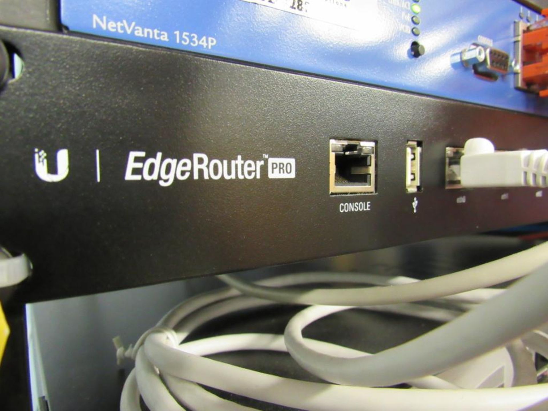 LOT: (1) Edge Router Pro, (1) D-Link DXS-1210-12SC