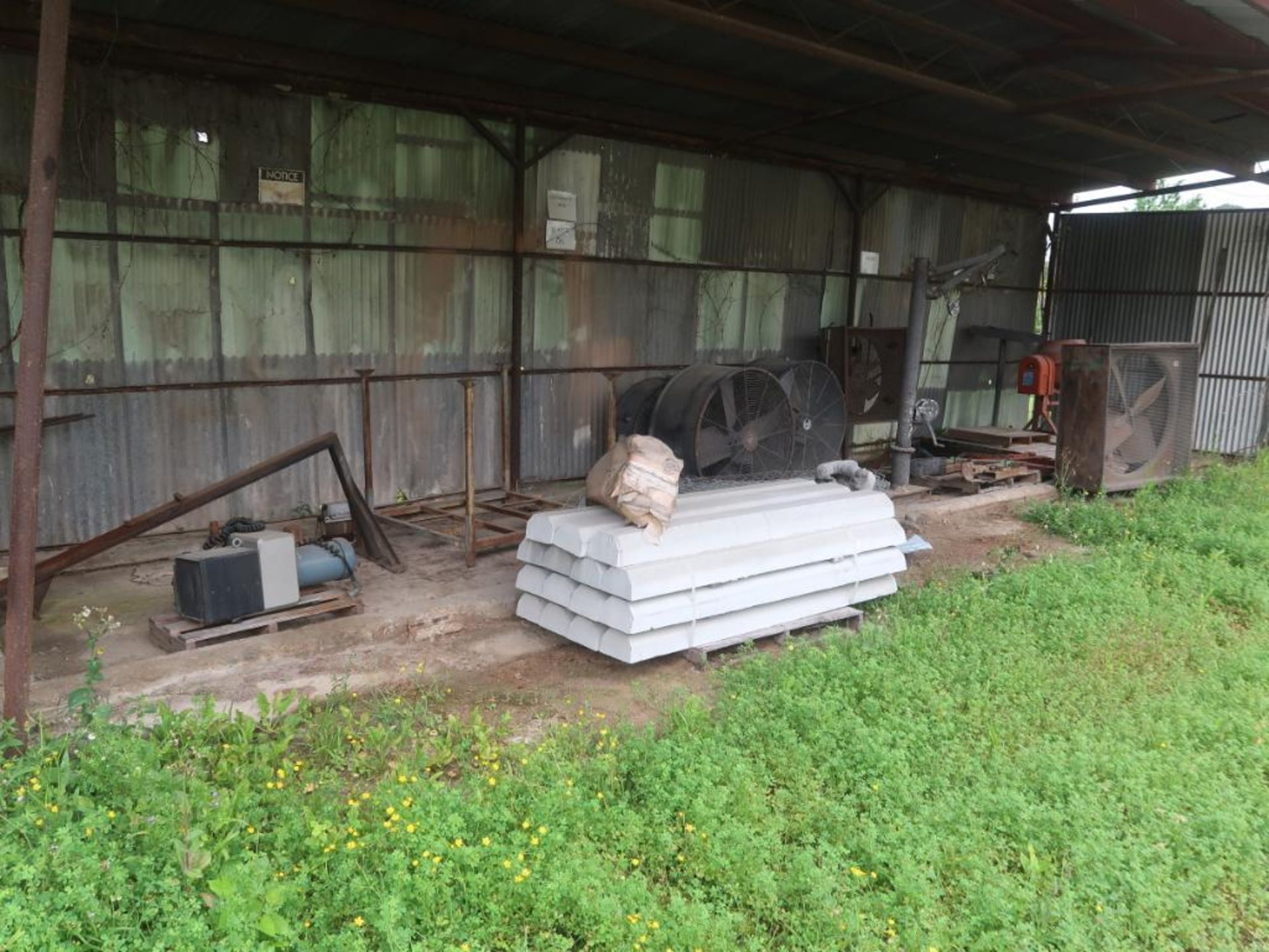 LOT: (1) Section Pallet Rack with Contents, Contents of Outdoor Storage Area, Tank, Cement Mixer,