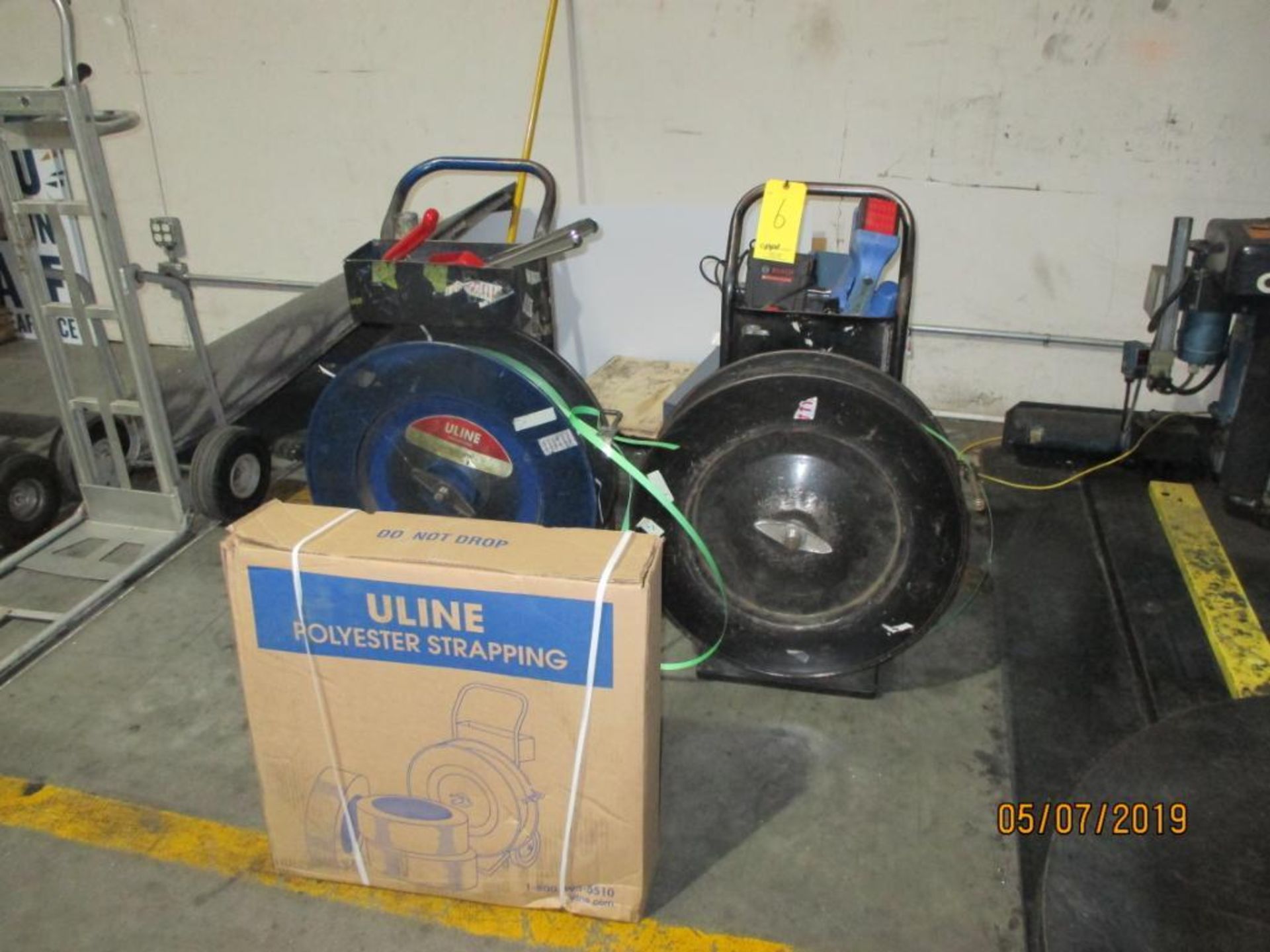 LOT: (2) Strapping Machines with Closing Tools & (1) Box Uline Polyester Strapping Material