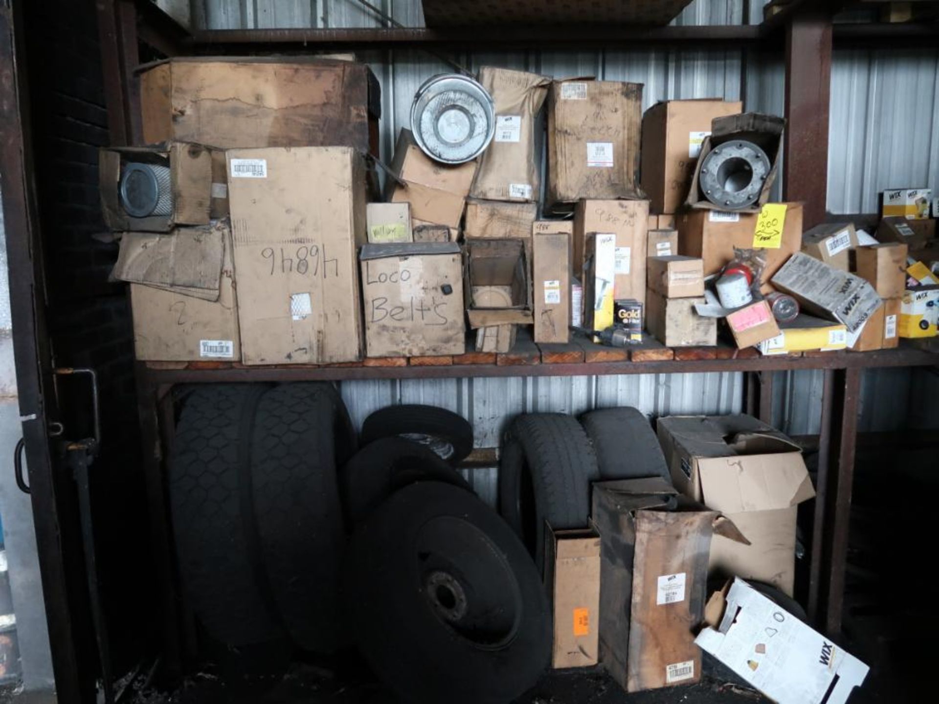 Contents of Garage Storage, including Heavy Equipment Parts, Filter, Cores, Tires (go to - Image 3 of 7