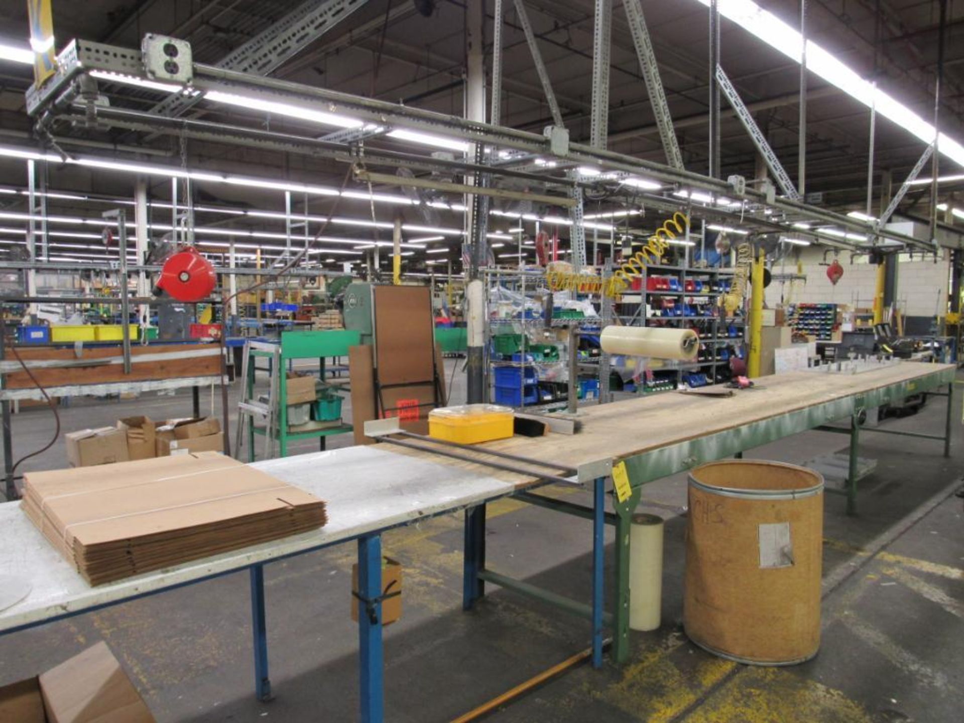 LOT: Packaging Lines #K & #J including: (1) 36 in. x 20 ft. Roller Conveyor used as Work Table (1) 3