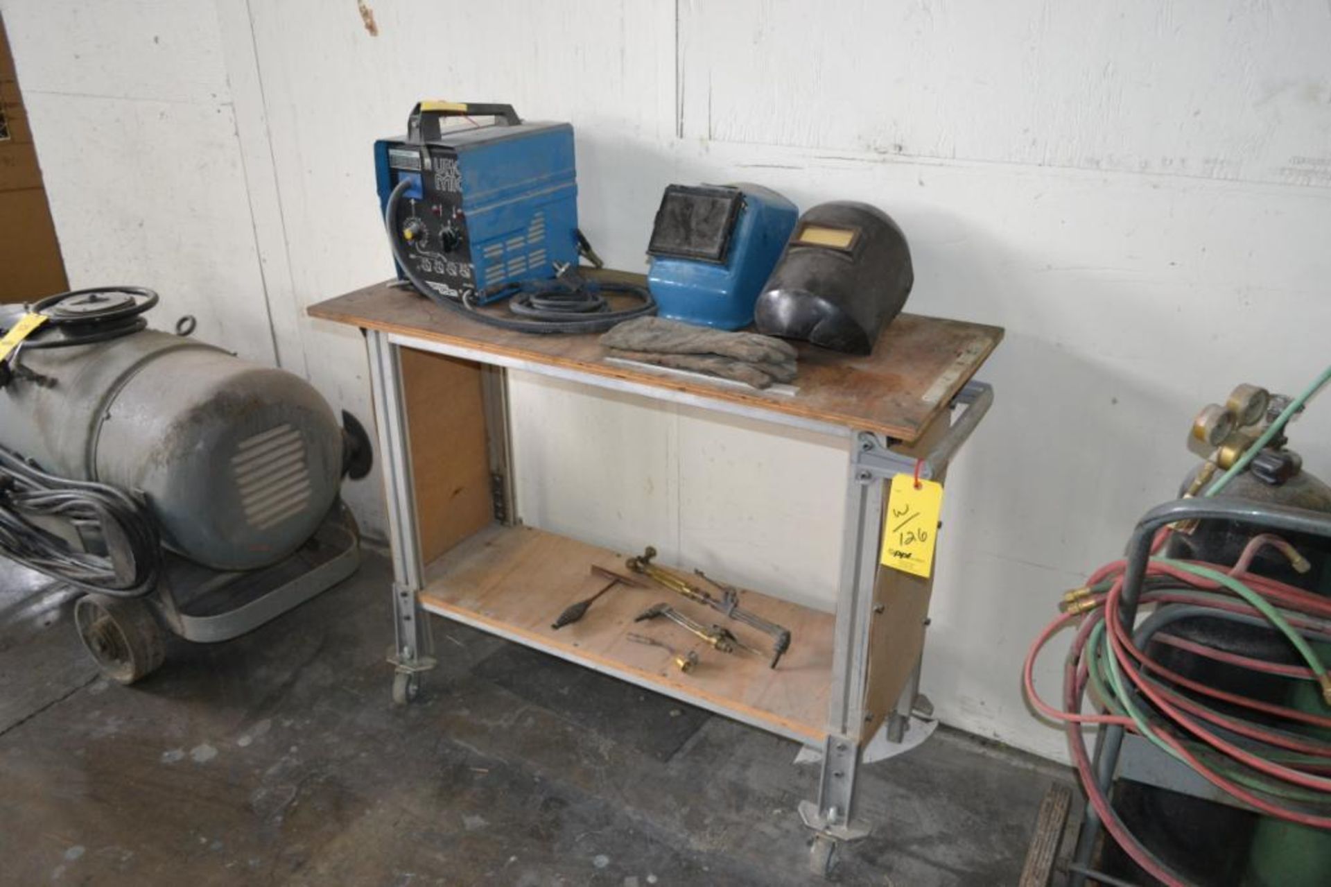 LOT: Uno MIG Welder (on table), with (2) Helmets & Assorted Torches