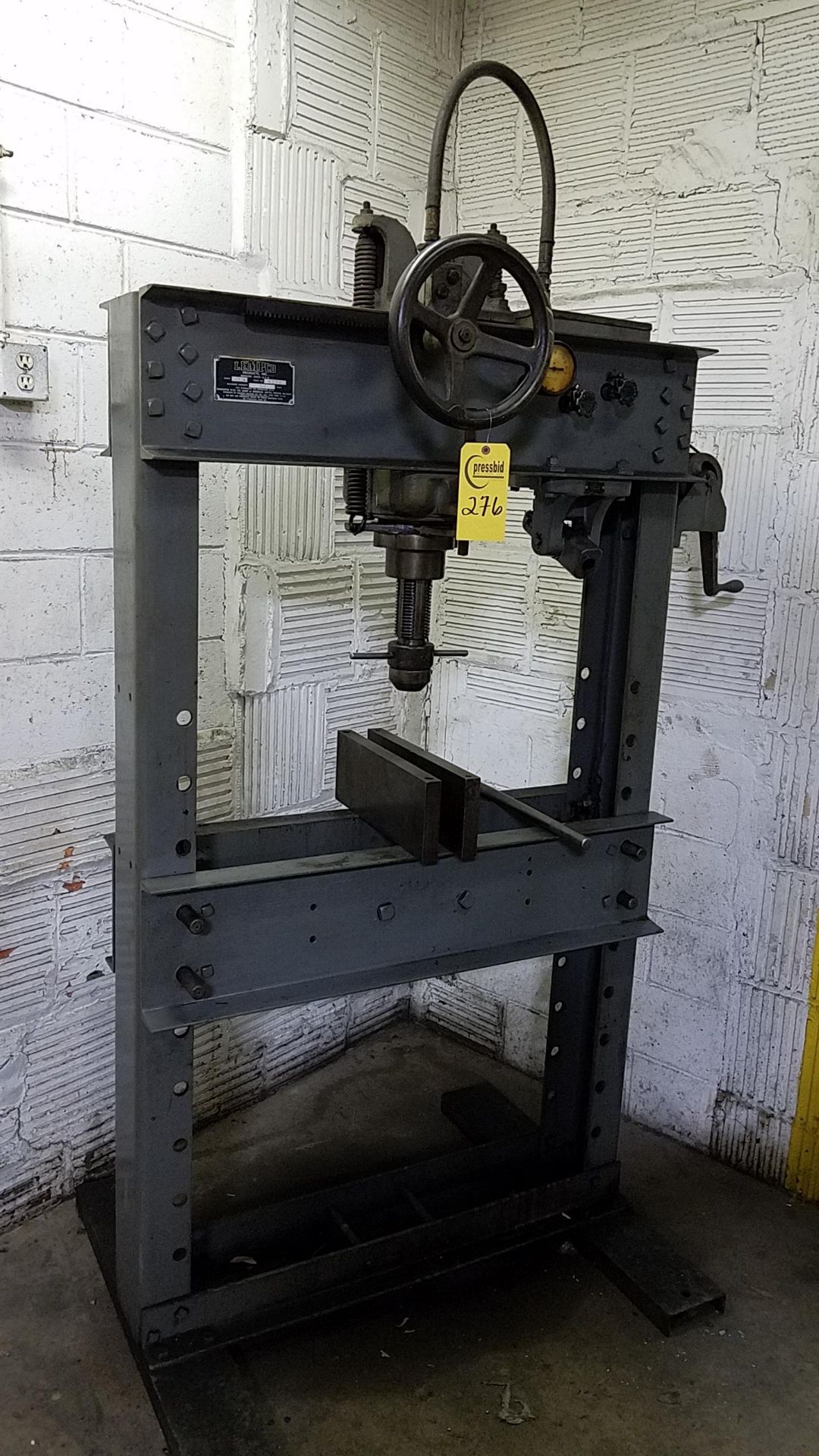 Lemped manual H-Frame shop press with adjustable bed