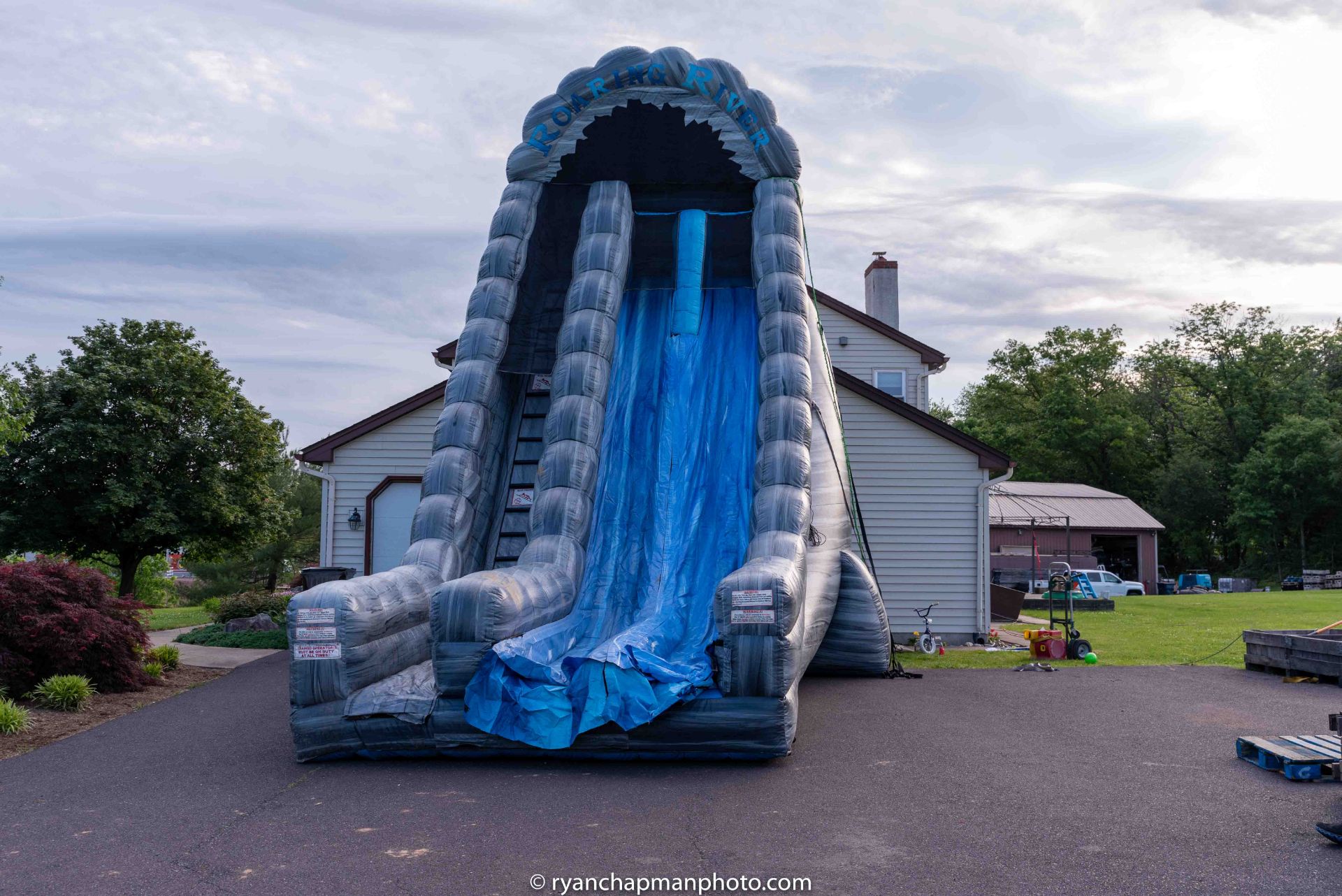 ROARING RIVERS CURVED SLIP-N-SLIDE INFLATABLE - (LOCATED AT TELFORD, PA) - Image 5 of 7