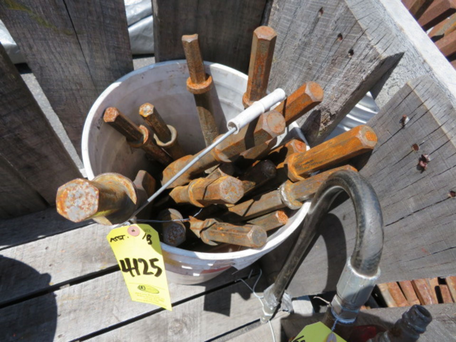 BUCKET OF ASSORTED JACK HAMMER TOOLS