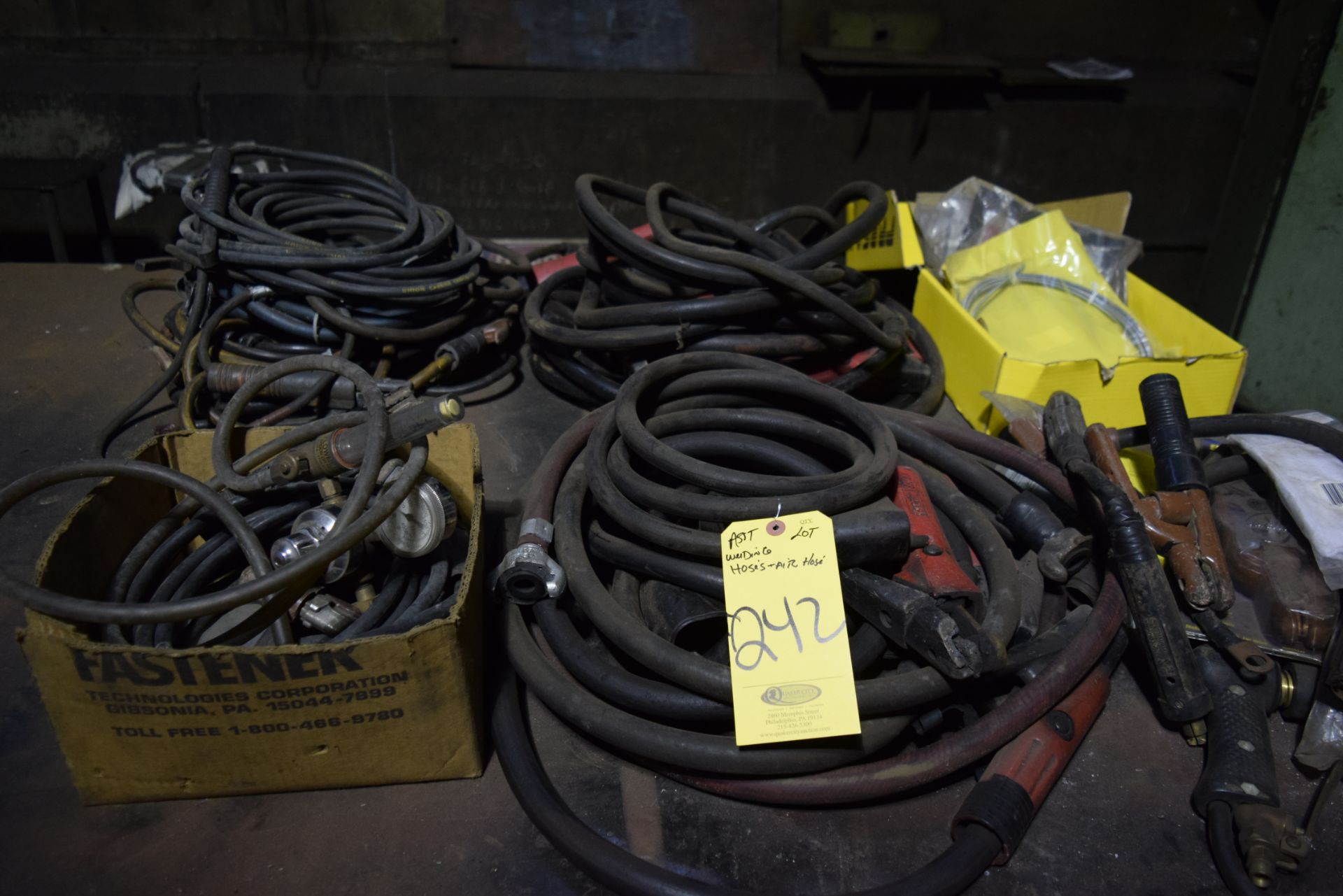 ASSORTED WELDING ITEMS ON TABLE