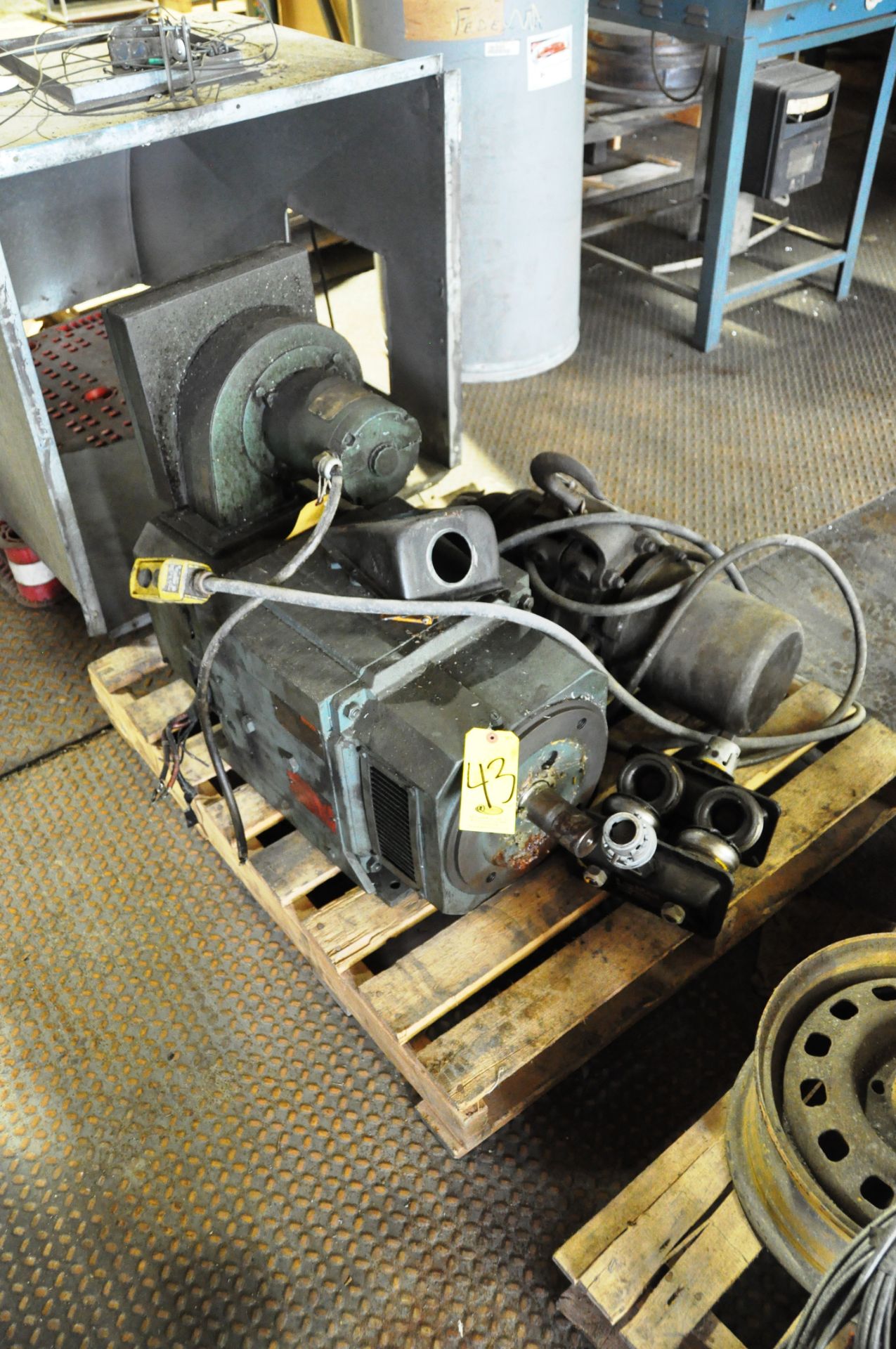 SKID WITH ELECTRIC MOTOR AND HOIST AND METAL HOOD