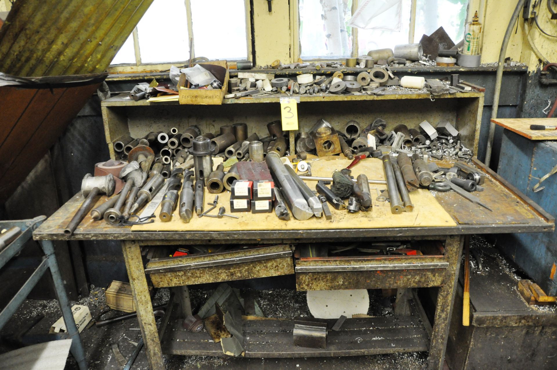 METAL WORK BENCH WITH ASSORTED CONTENTS