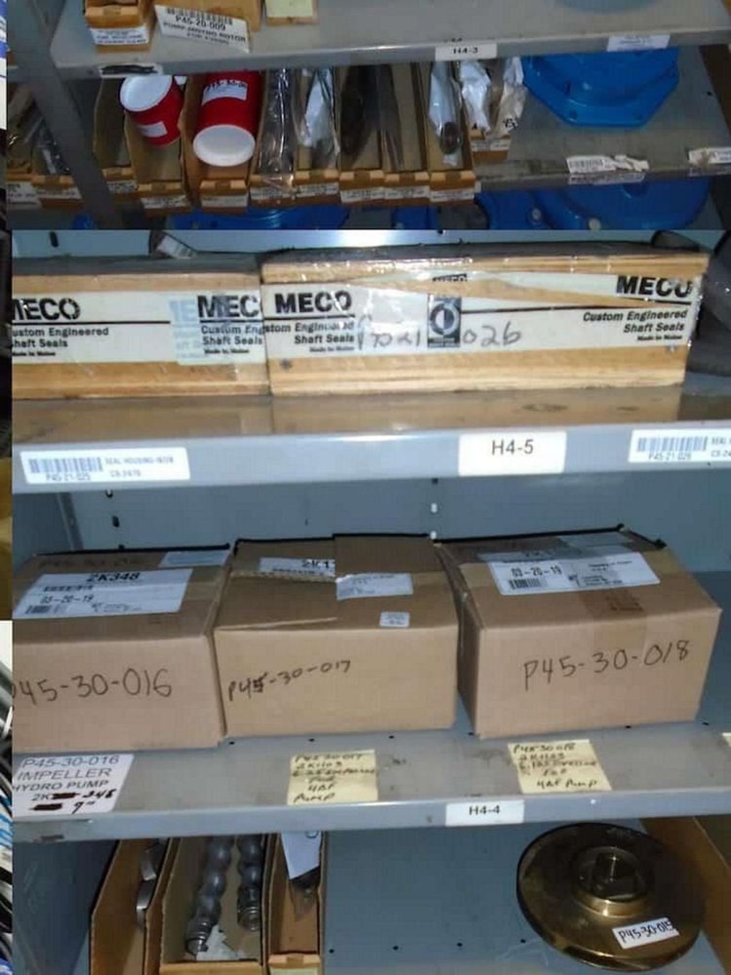 Contents of Shelves ( Assorted Meco Seal Kits, Impeller Pump Parts)