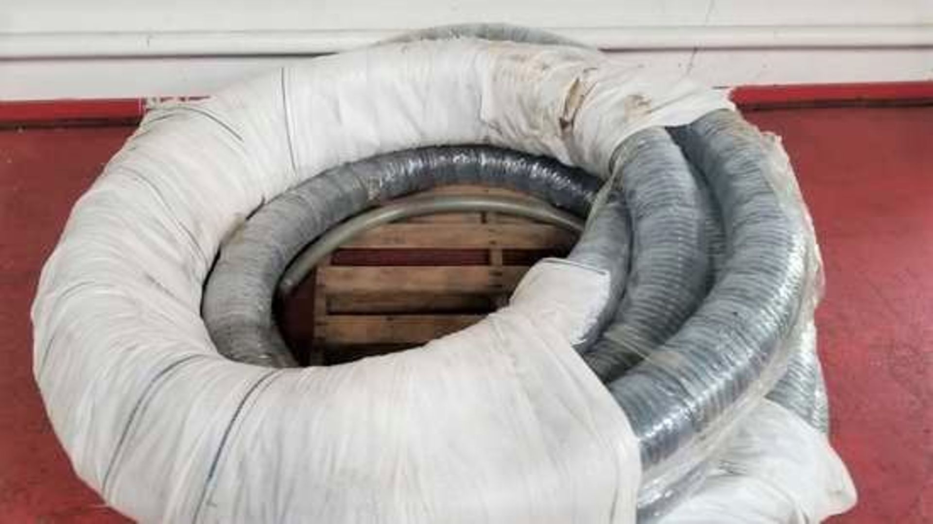 Lot of New 5" Vacuum Loading Hose. Lot of approximately 125' of new (still in OEM wrap) 5" vacuum