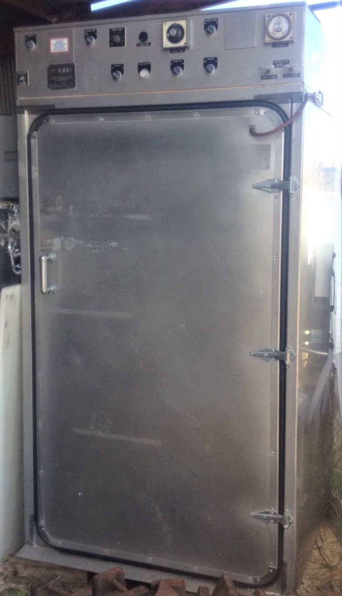 Alkar 1-Truck Electric Smokehouse. Sold with two trucks and screens. Offered AS IS FOB S Central