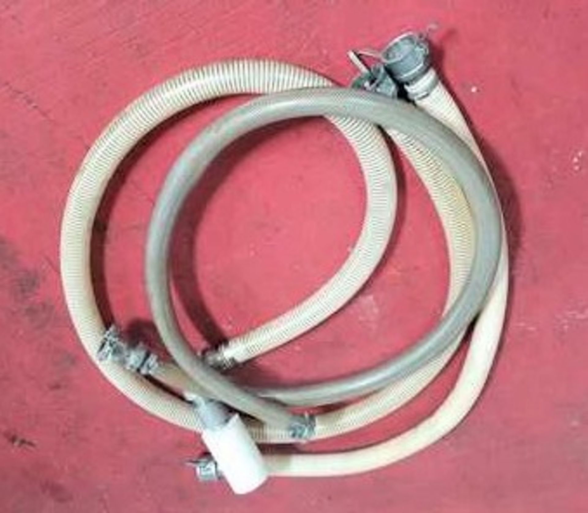 3 pieces of 2" vacuum quick-couple hose . Each hose has quick couple on both ends. One piece has