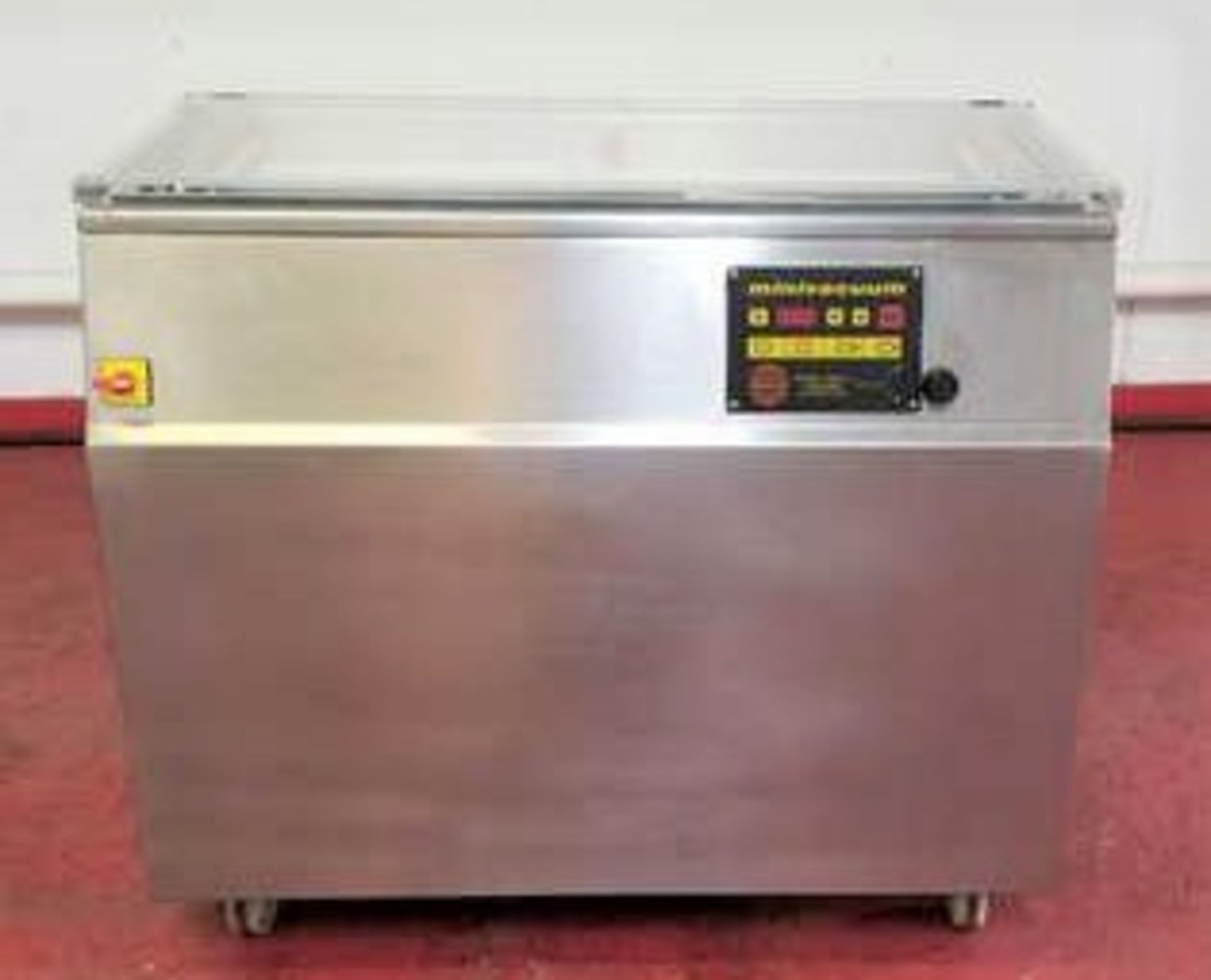 Vacuum Packager Single Chamber. Minivaccum. Two seal bars on opposite sides of 35"L x 14"W x 4.5"D