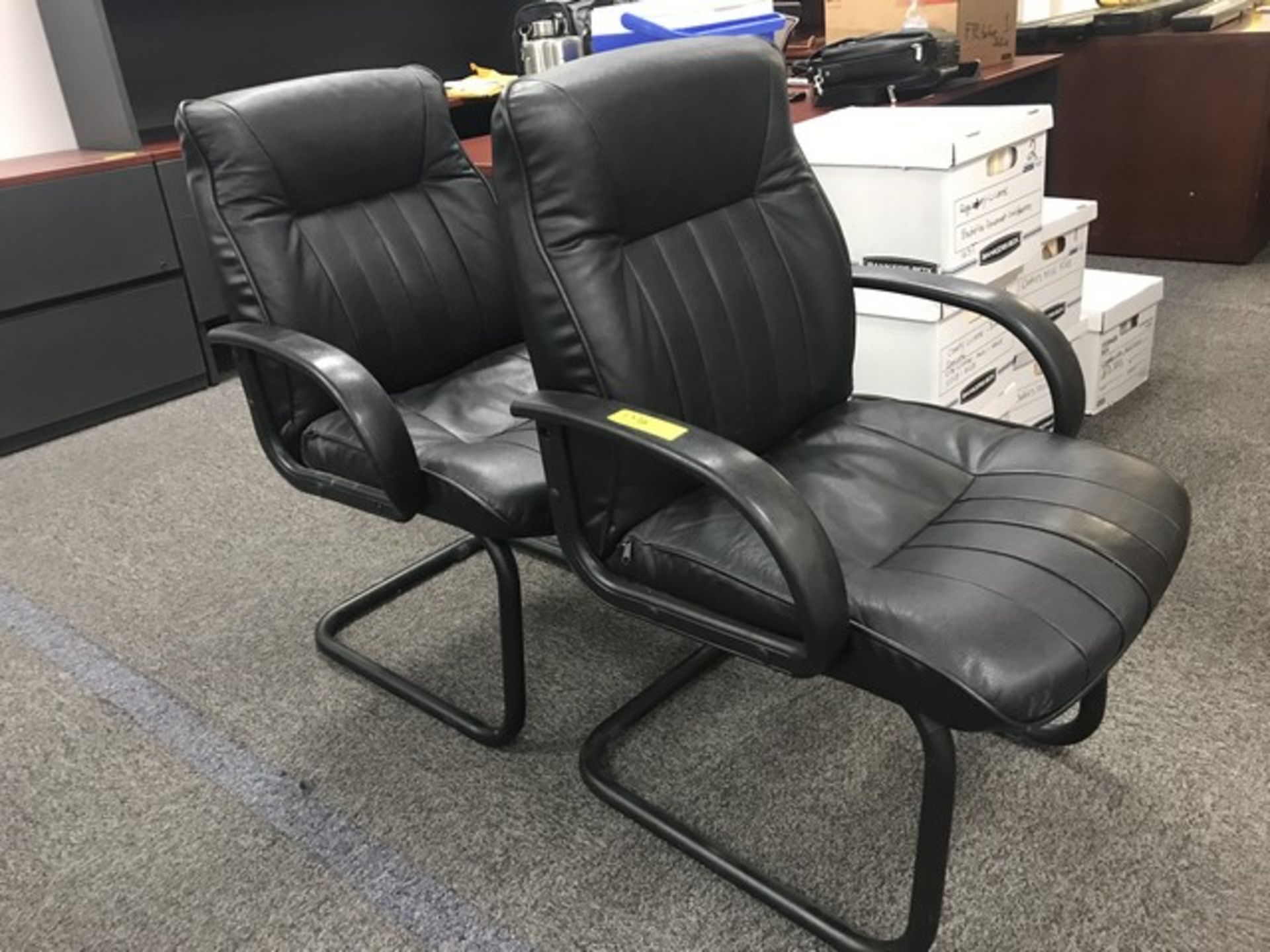 BLACK LEATHER PADDED CLIENT CHAIRS
