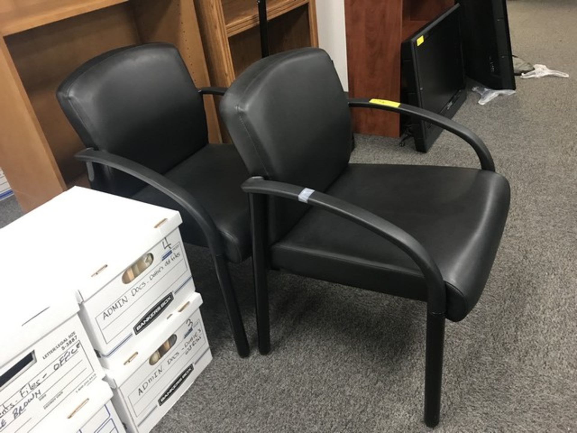 BLACK LEATHER CLIENT CHAIRS