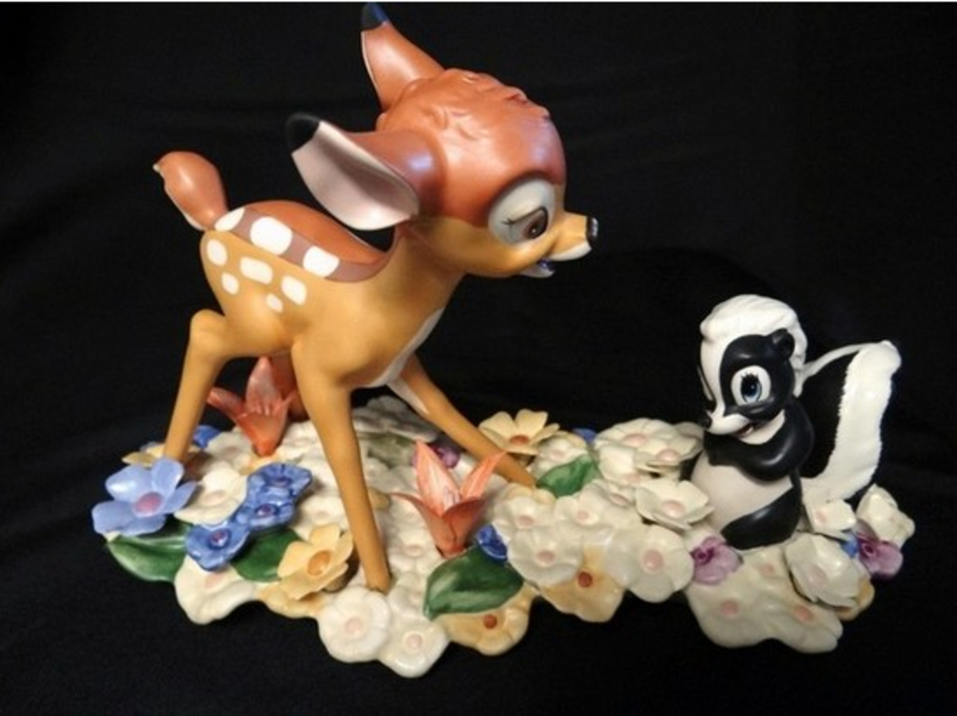 WALT DISNEY COLLECTIBLE - BAMBI & FLOWER (FOB HOLLYWOOD, FL)