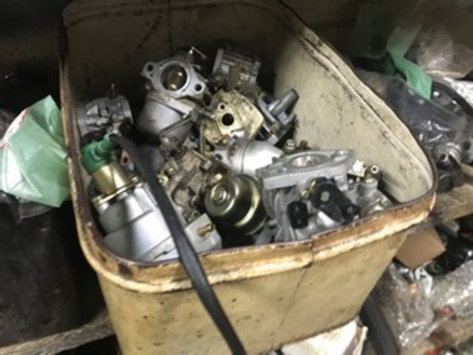 LOT RACKING WITH MOWER, TRIMMER & CHAIN SAW PARTS - CARBURETORS, TIRES, SPARK PLUGS & MORE - Image 8 of 8